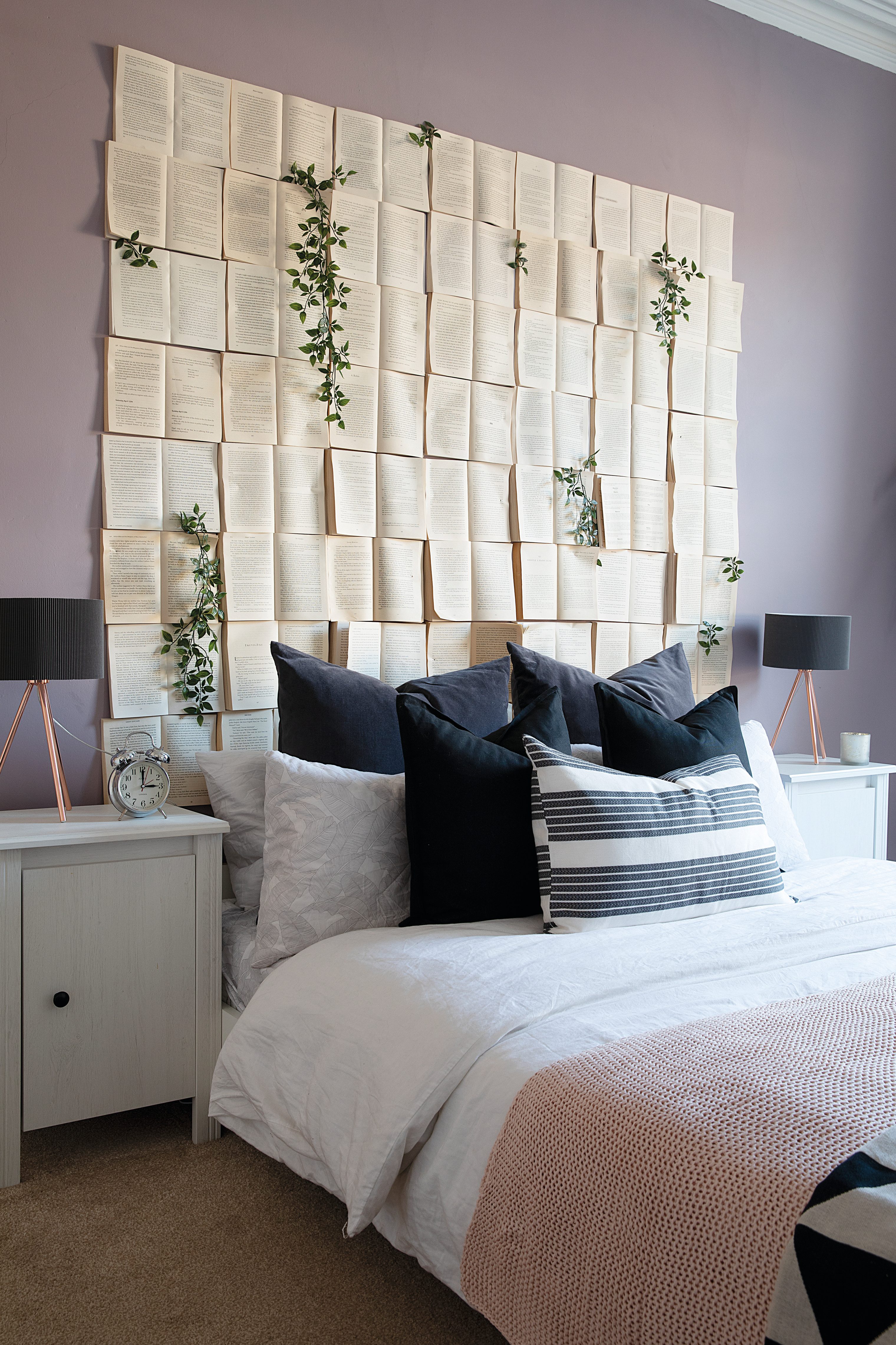 I made it from old books we already had and nailed them to the wall,’ says Charlotte. She bought the bedside table from IKEA A headboard made out of books