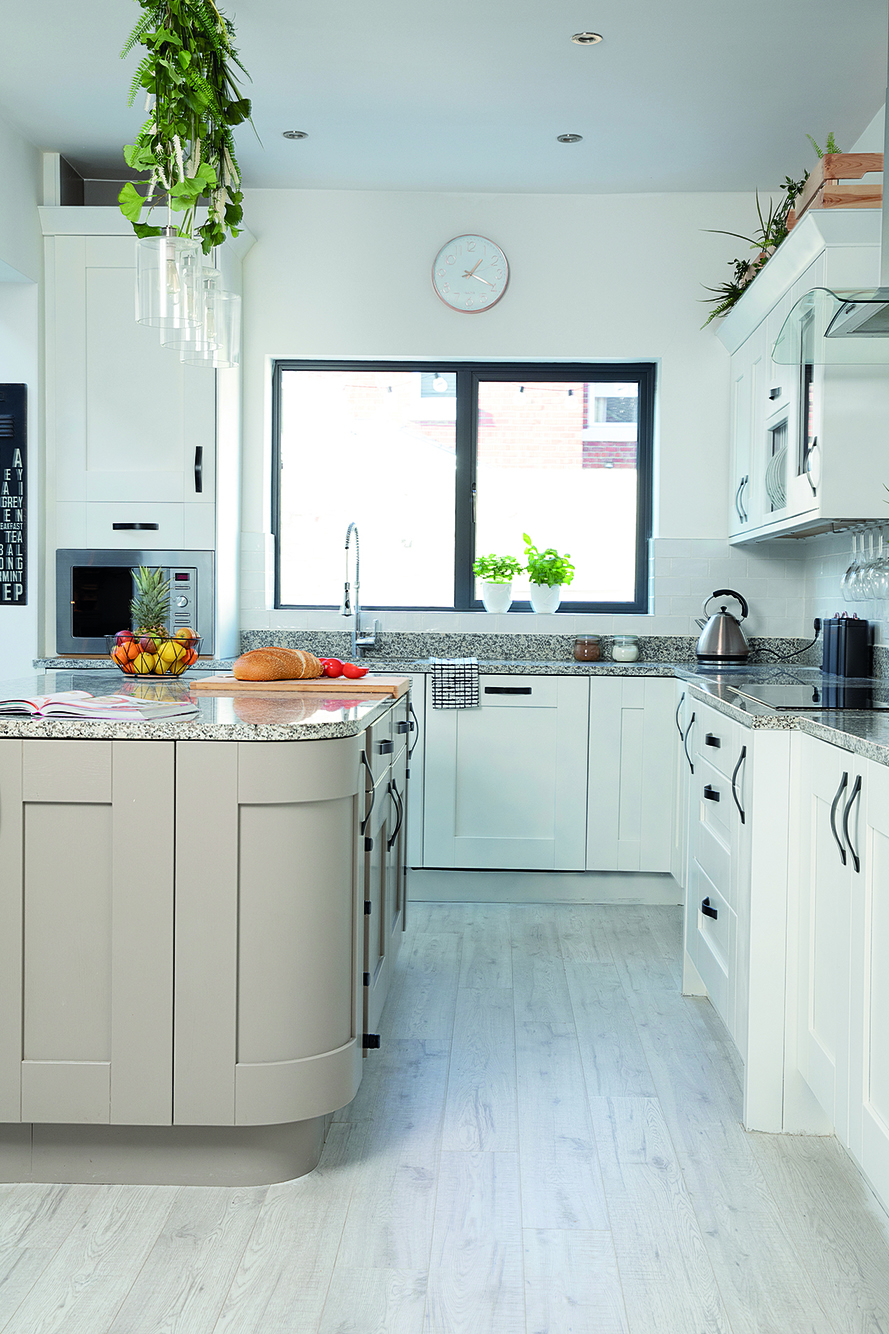 ‘We replaced the dark brown laminate flooring in here for a light grey design from B&Q, which works much better’ says Charlotte ‘We replaced the dark brown laminate flooring in here for a light grey design from B&Q, which works much better’ says Charlotte