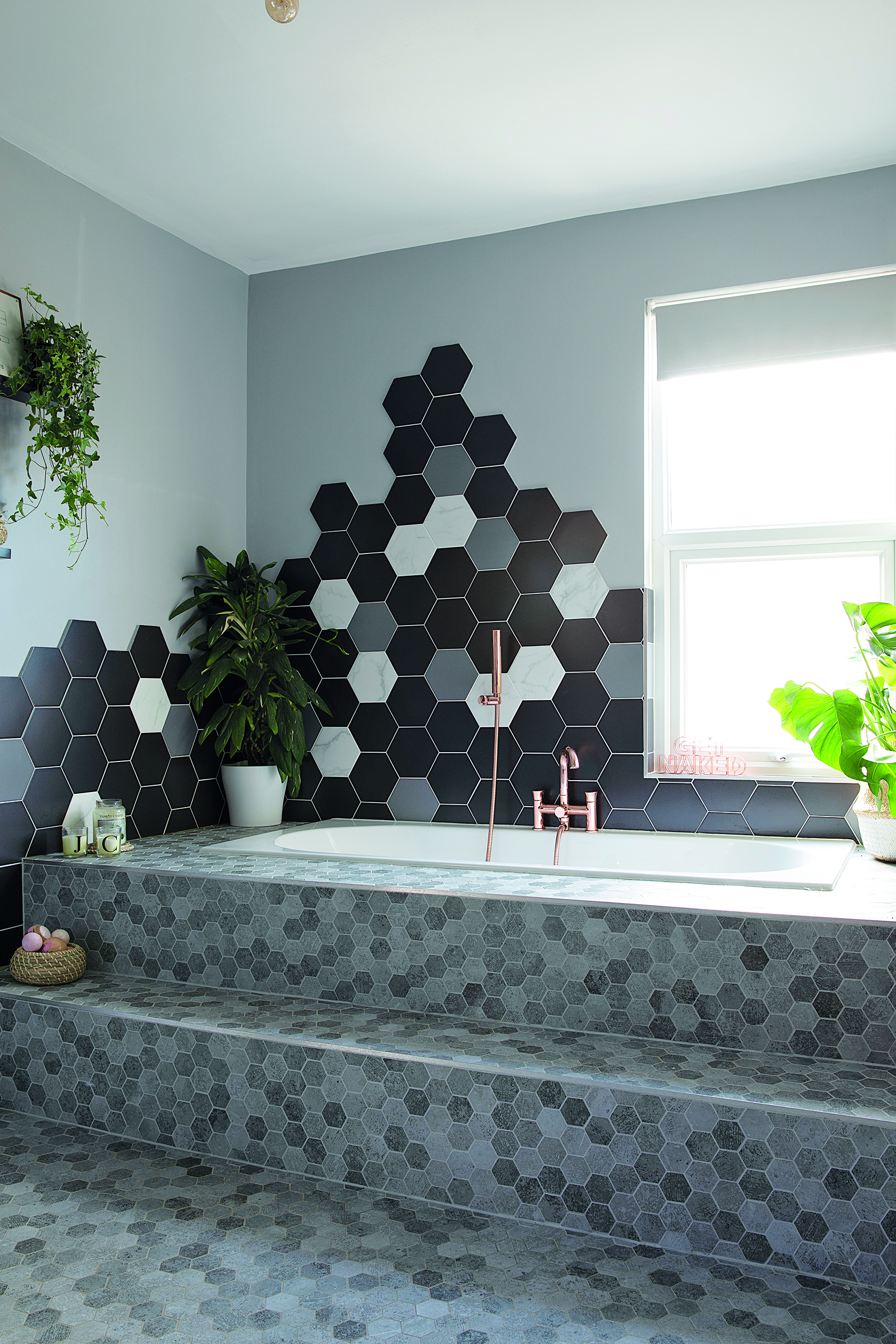 Although the hexagon tiles were tricky to fit, Charlotte loves the luxurious look they bring to her new bathroom. British Ceramic Tile has similar hexagon wall tiles and Tiles Direct has similar mosaic floor tiles A boutique style bathroom with hexagon wall tiles