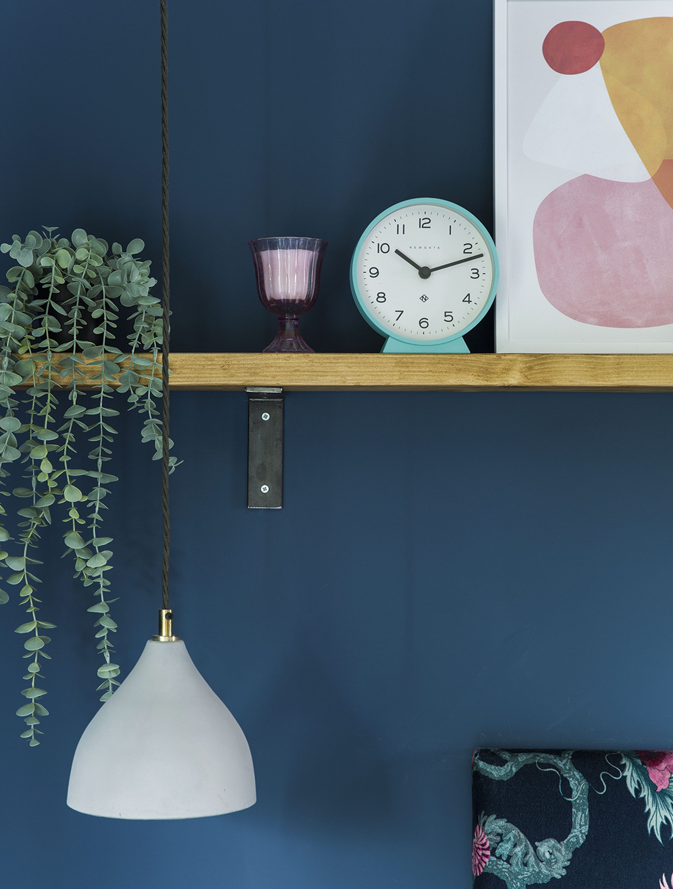 Recycled scaffold wood is used to create a striking shelf above the bed to display colourful prints, plants and Becky’s favourite accessories. Hanging ceiling pendants are a stylish option for bedside lighting Recycled scaffold wood is used to create a striking shelf above the bed to display colourful prints, plants and Becky’s favourite accessories. Hanging ceiling pendants are a stylish option for bedside lighting