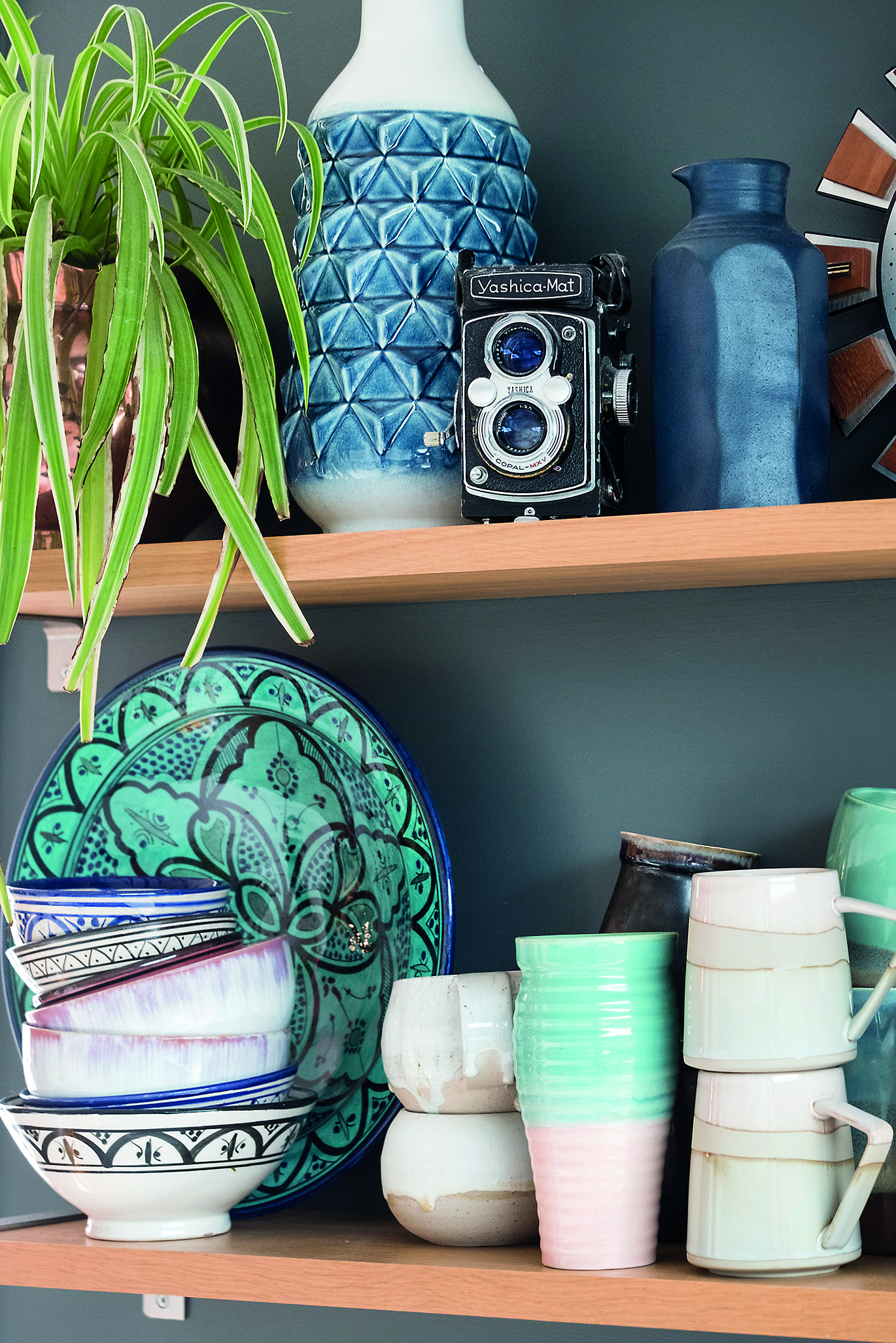 The kitchen shelves show off a characterful china collection alongside one of Sophie’s late father’s old cameras. ‘There’s pottery by local craftspeople, pieces from holidays abroad and even budget bits from TK Maxx, and most of it gets used every day,’ she says