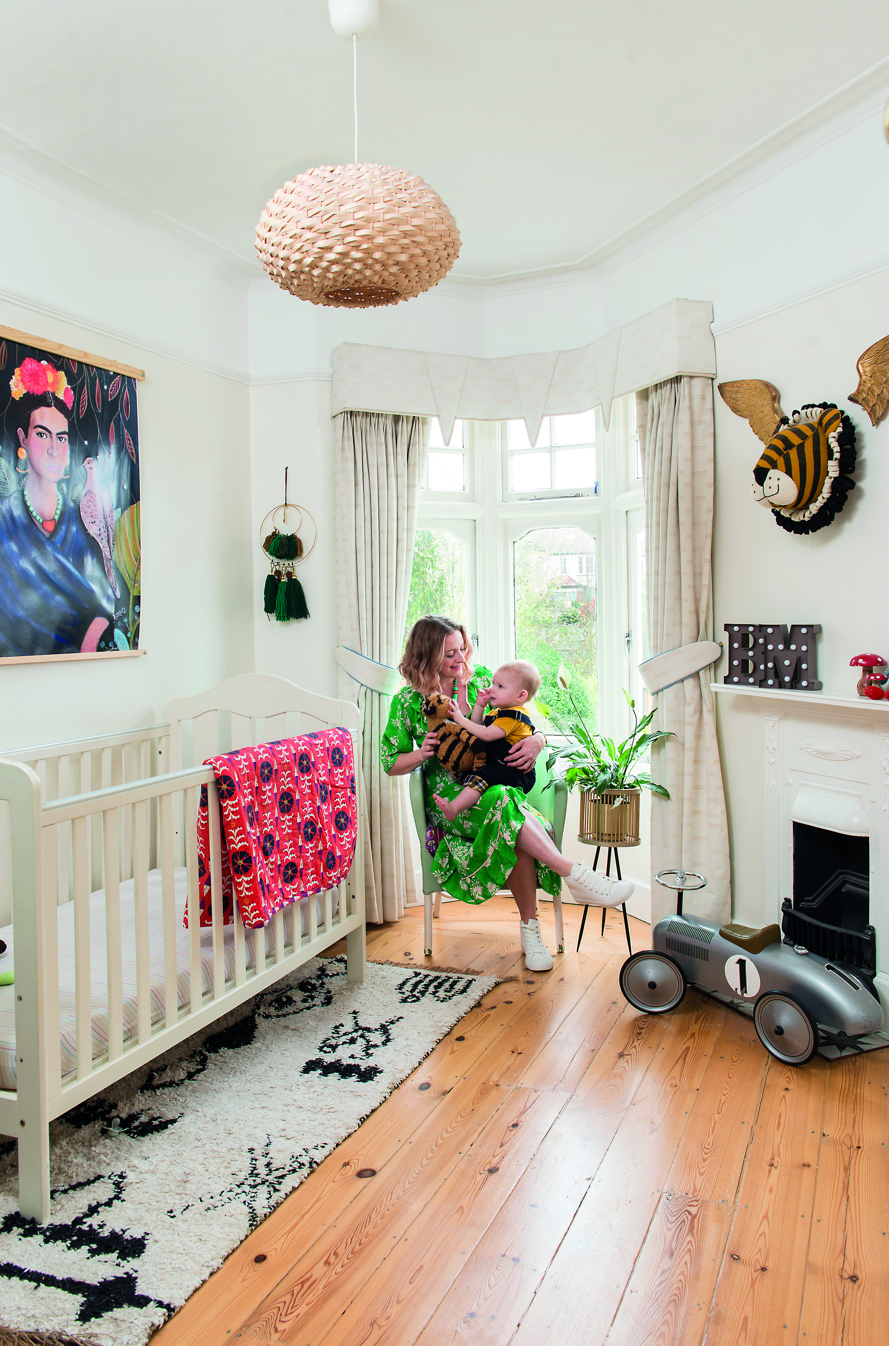 ‘I kept the curtains that were here in Bowe’s room already, as they’re neutral and do a great job blocking the light,’ says Sophie. ‘His cot is a family hand-me-down and the Lloyd Loom chair was a charity shop buy that I’ve painted’
