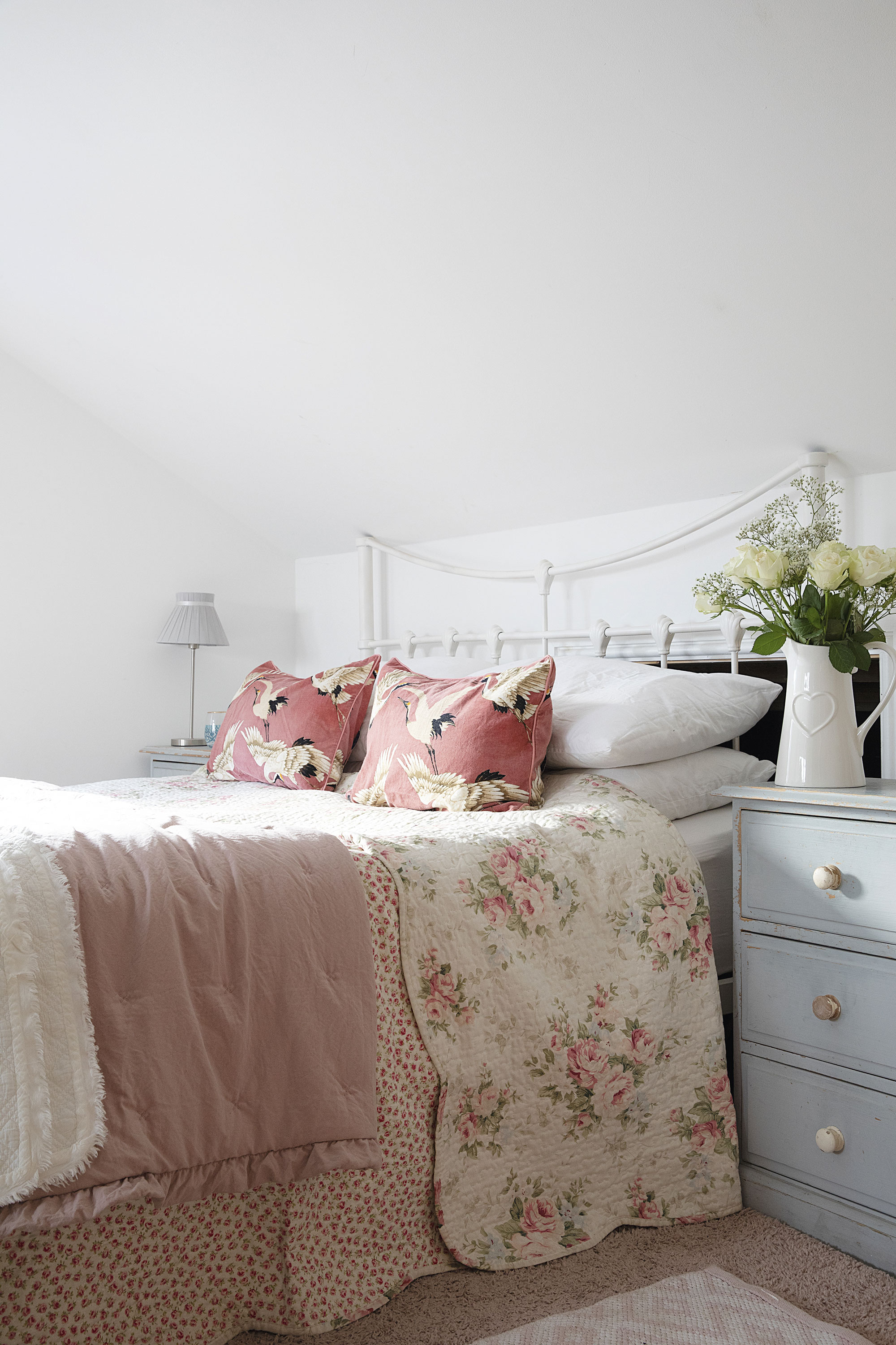 With white walls, the master bedroom has a calm feel to it, but With white walls, the master bedroom has a calm feel to it, but