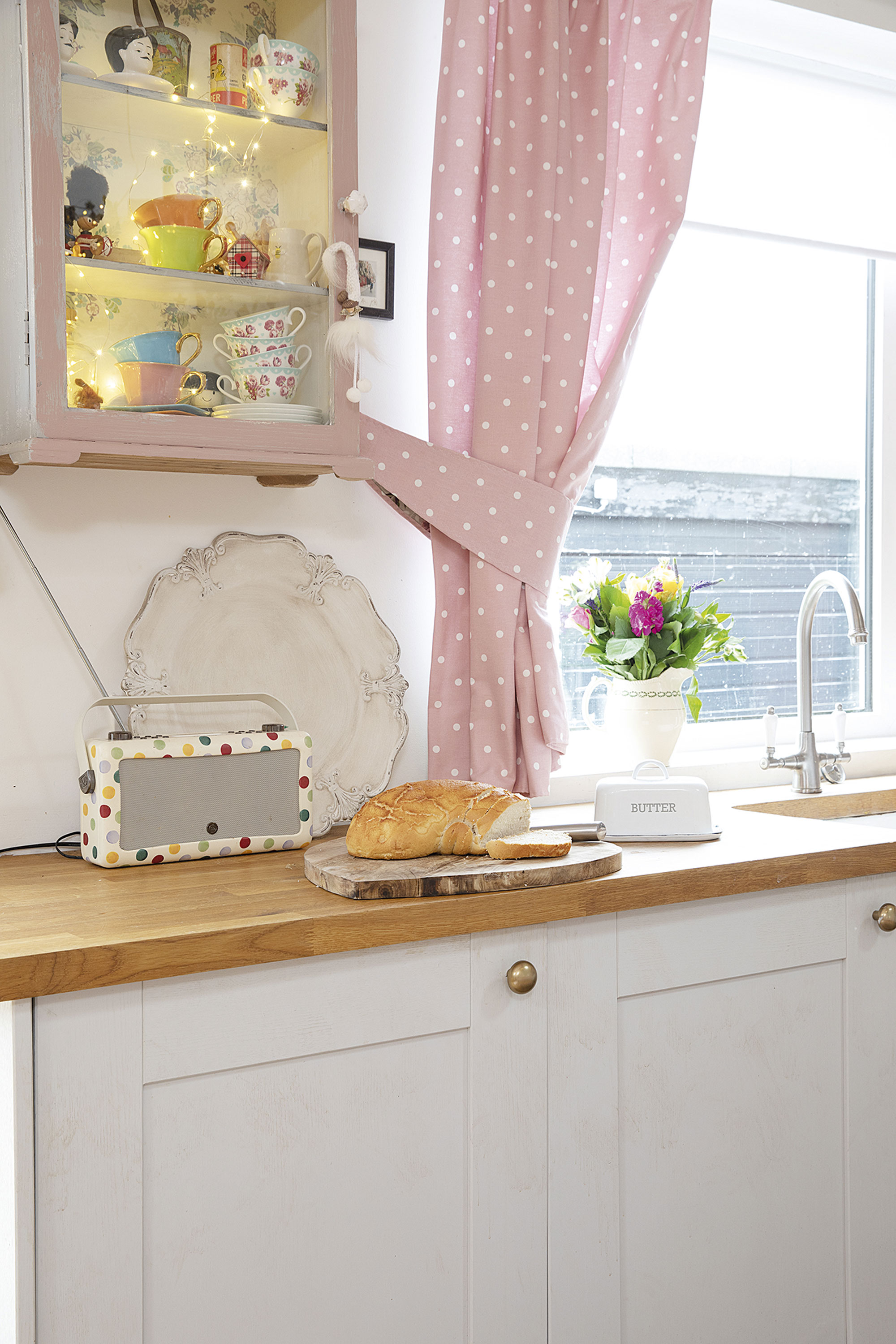 Pink polka dot curtains give the kitchen a cute cottagecore style. The spotty theme continues with the Emma Bridgewater radio Pink polka dot curtains give the kitchen a cute cottagecore style. The spotty theme continues with the Emma Bridgewater radio