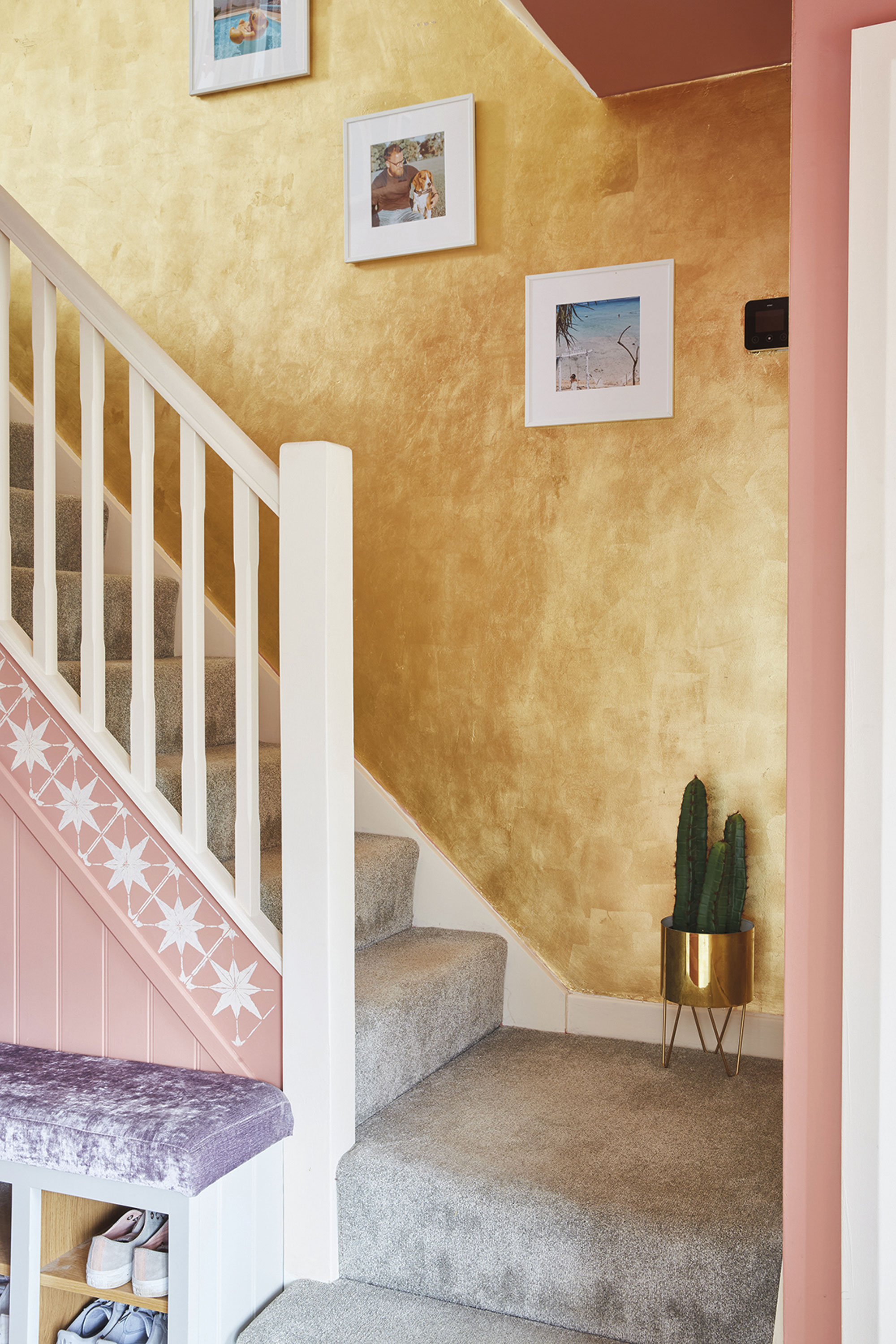 ‘I’m inspired by Palm Springs and Moroccan design, and as our hallway is quite long and dark, I knew it could take a bold look. The terracotta on the walls makes me happy as soon as I walk downstairs for my morning coffee or get in from a rubbish day. The gold leaf up the stairs was a project I won’t be repeating again any time soon as it took me a while to do. However, I love the finished result – the way the terracotta reflects the gold makes me feel like I’m on a beach at sunset’ ‘I’m inspired by Palm Springs and Moroccan design, and as our hallway is quite long and dark, I knew it could take a bold look. The terracotta on the walls makes me happy as soon as I walk downstairs for my morning coffee or get in from a rubbish day. The gold leaf up the stairs was a project I won’t be repeating again any time soon as it took me a while to do. However, I love the finished result – the way the terracotta reflects the gold makes me feel like I’m on a beach at sunset’