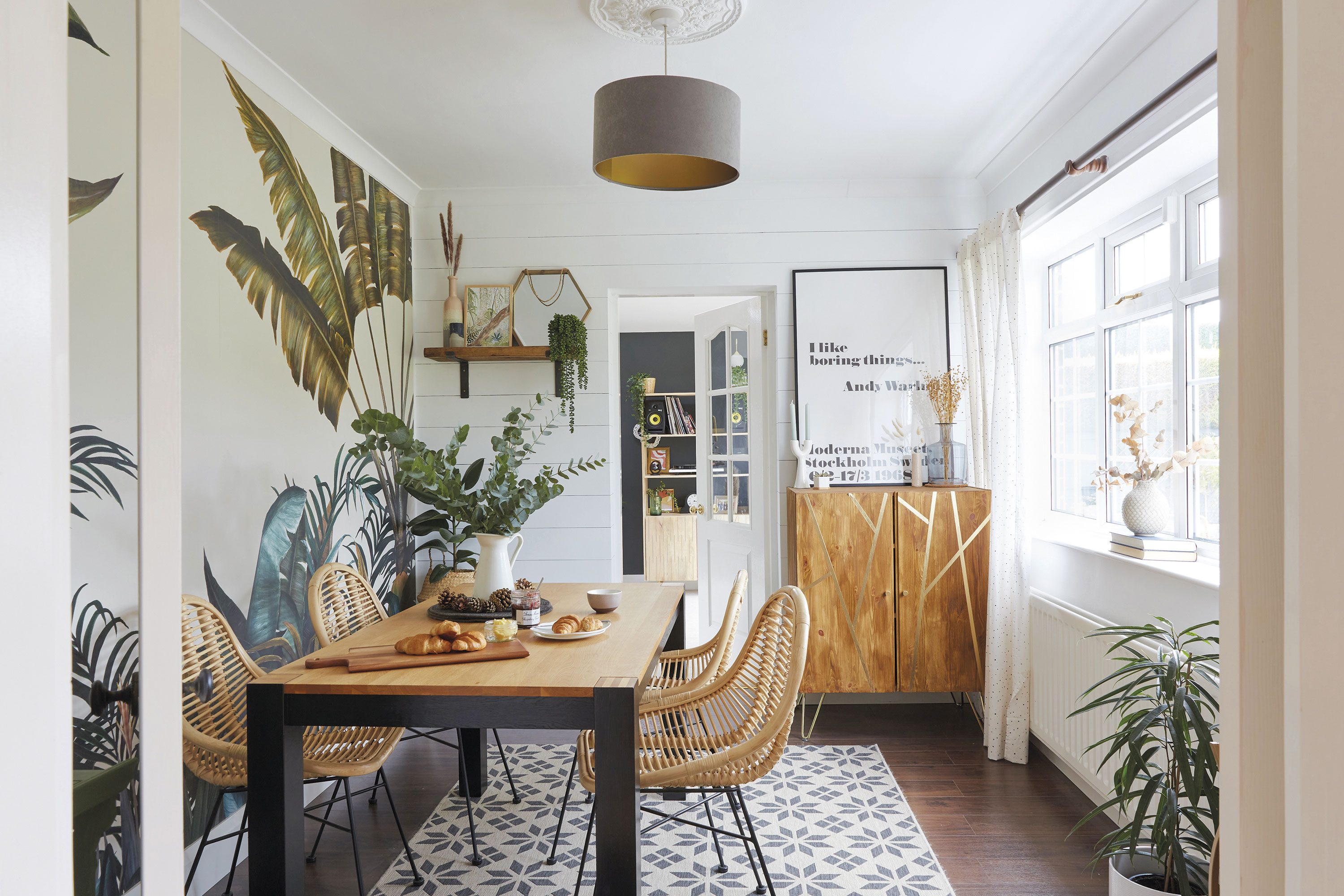 ‘I bought the table and chairs from Wayfair and they look fab against the tropical leaf mural, which is from Photowall. My aim was to create a focal point in here, which I think I have done’