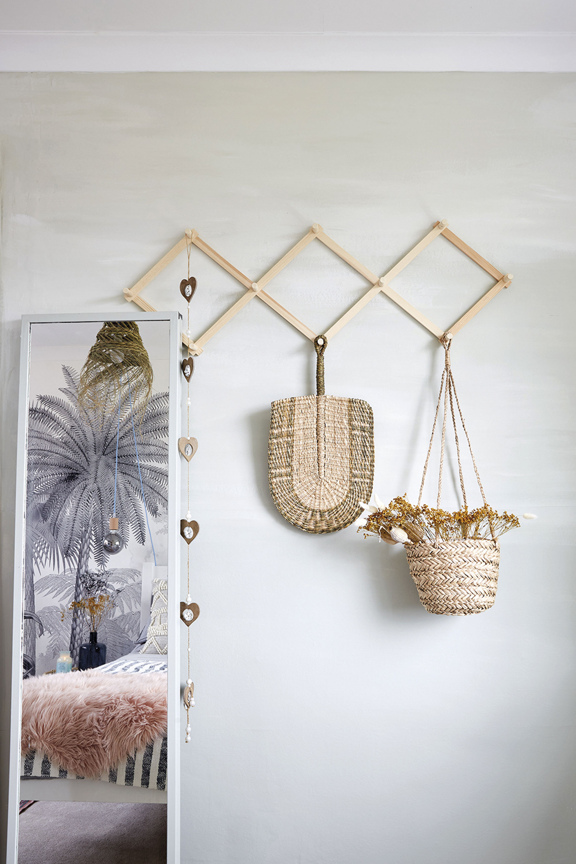 ‘I wanted to create a corner where guests could hang up their clothes to make it feel more homely. The peg rail is from Søstrene Grene. I painted the wall in this soft grey/green shade that’s colour matched to Mizzle by Farrow & Ball’ ‘I wanted to create a corner where guests could hang up their clothes to make it feel more homely. The peg rail is from Søstrene Grene. I painted the wall in this soft grey/green shade that’s colour matched to Mizzle by Farrow & Ball’