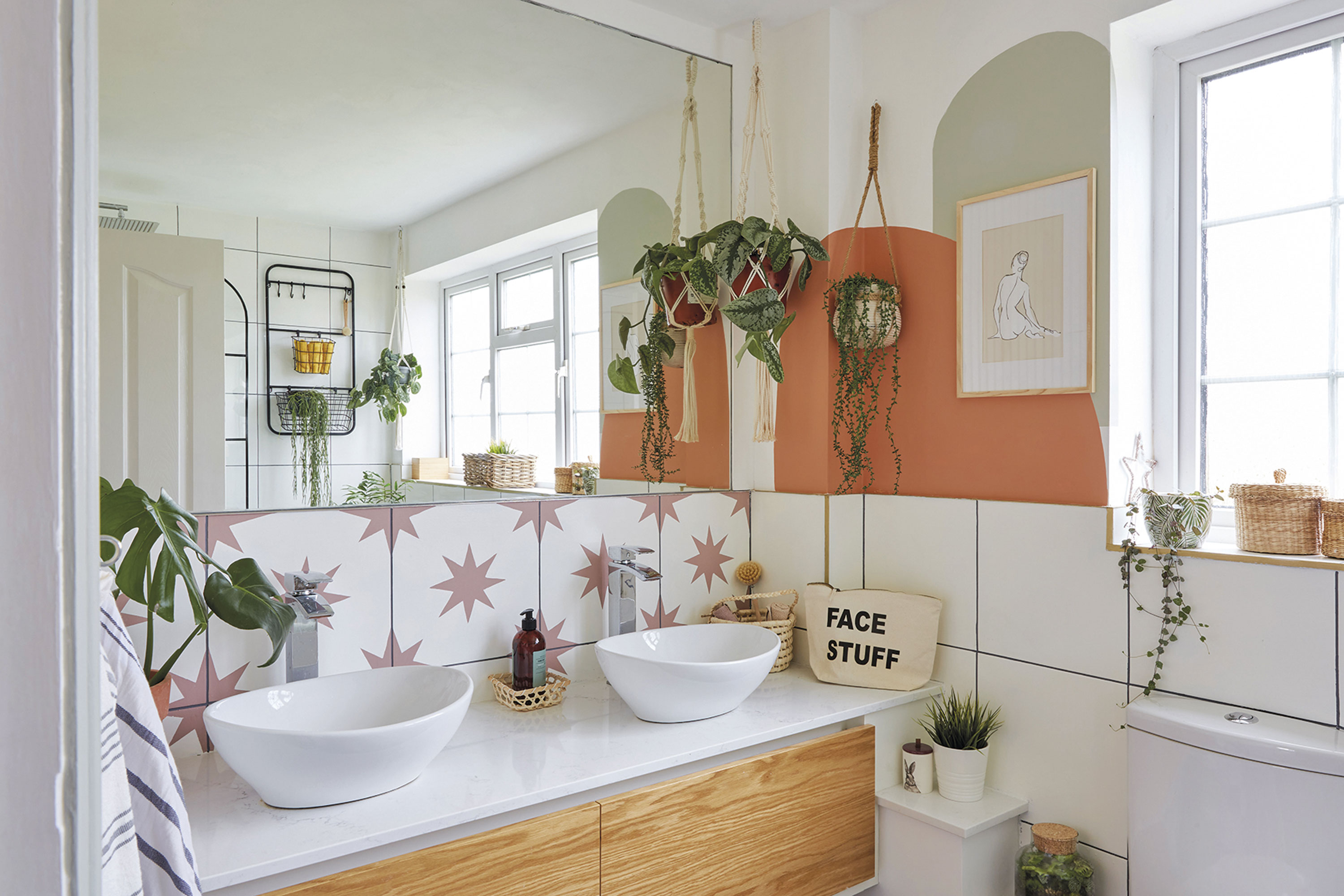 ‘The bathroom is a good size, but I wanted to make it feel more spacious, so I added the mirror and orange paint to add interest. The units were already there, and I painted the tiles. I’m really happy with them – they look like the real thing!’ ‘The bathroom is a good size, but I wanted to make it feel more spacious, so I added the mirror and orange paint to add interest. The units were already there, and I painted the tiles. I’m really happy with them – they look like the real thing!’
