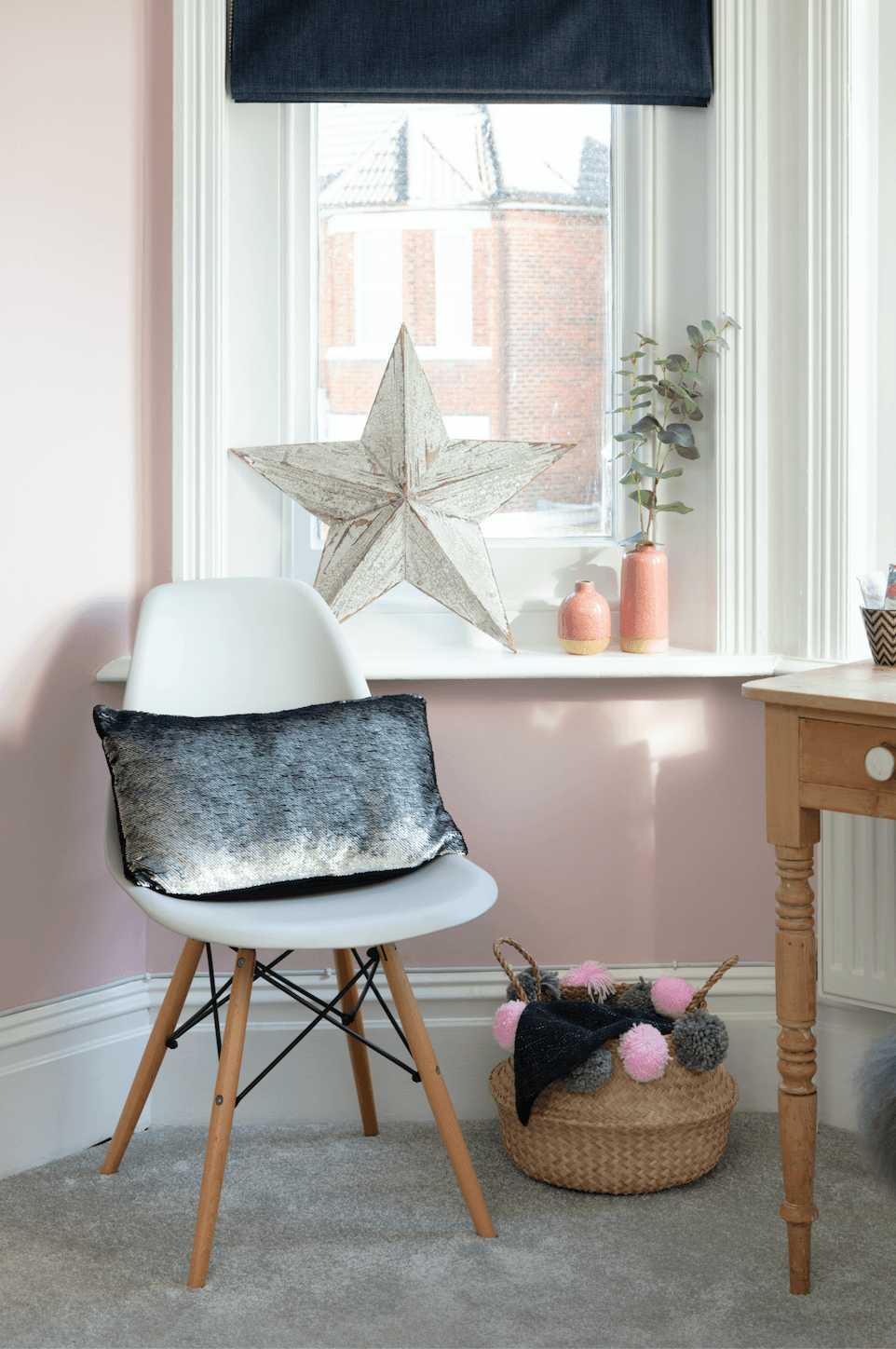 Rachel had the pink paint colour matched to the wallpaper to ensure they would both work together Bedroom makeover: 'Reusing old furniture kept our costs down'