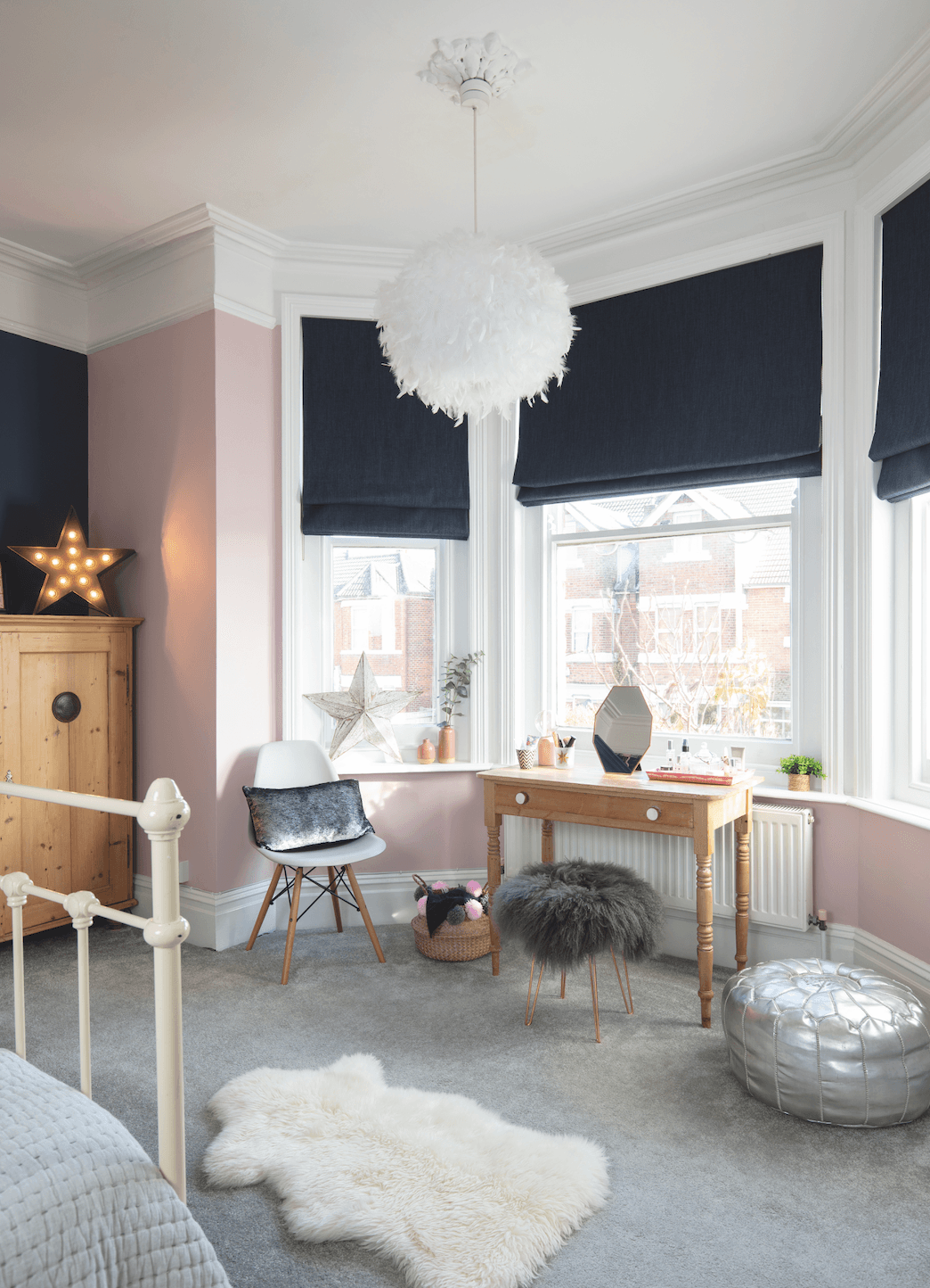 Rachel’s bedroom benefits from numerous original period features, including the fireplace, bay window and cornicing, which she has retained and worked into the design of the new room. By painting only below the picture rails, for example, the height of the Edwardian ceilings has been amplified Bedroom makeover: 'Reusing old furniture kept our costs down'