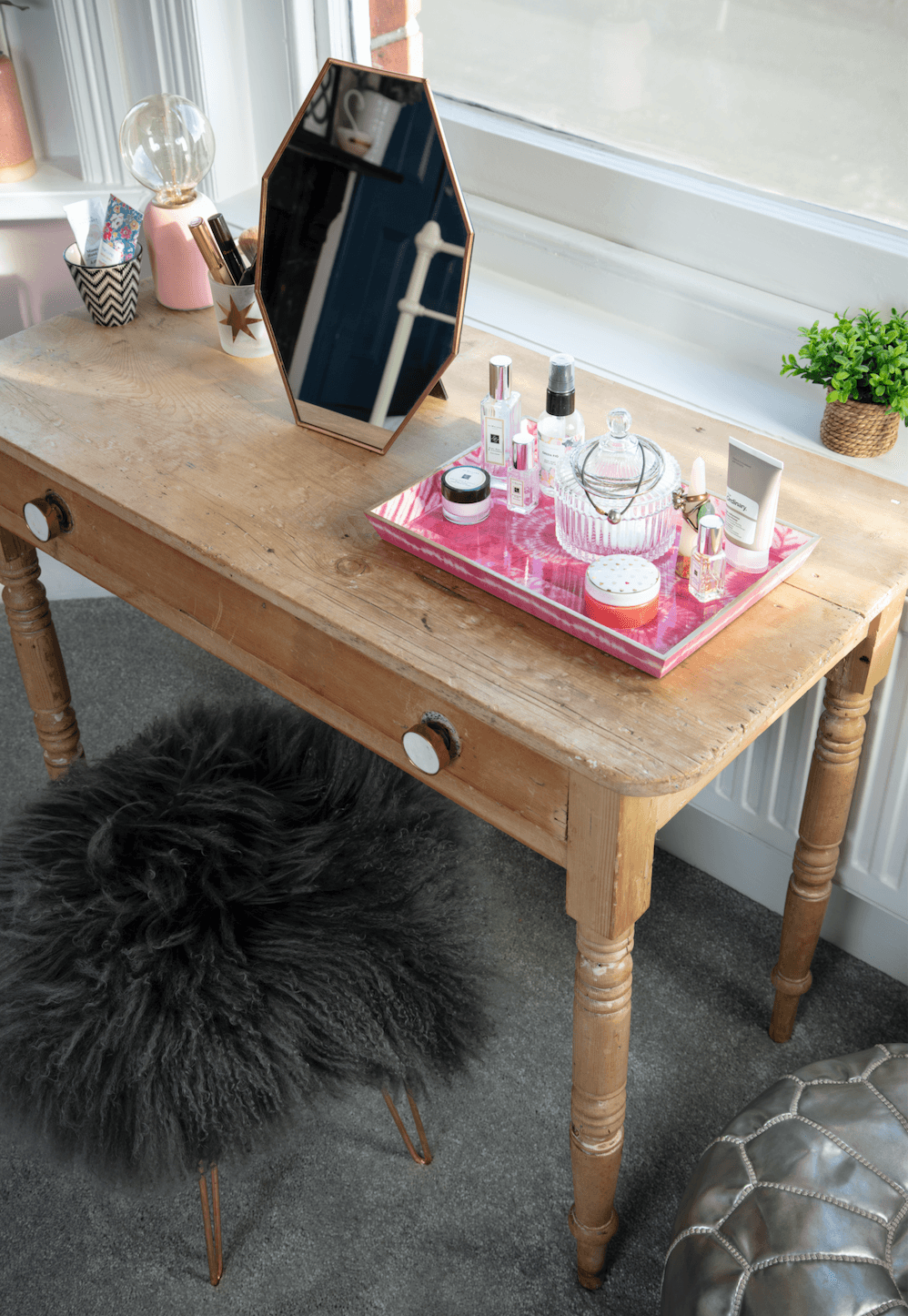 Rachel has breathed new life into this old dressing table by adding stylish handles and lining the drawer. This simple upcycle means it now fits in seamlessly with the new bedroom décor and takes pride of place beneath the bay window Bedroom makeover: 'Reusing old furniture kept our costs down'