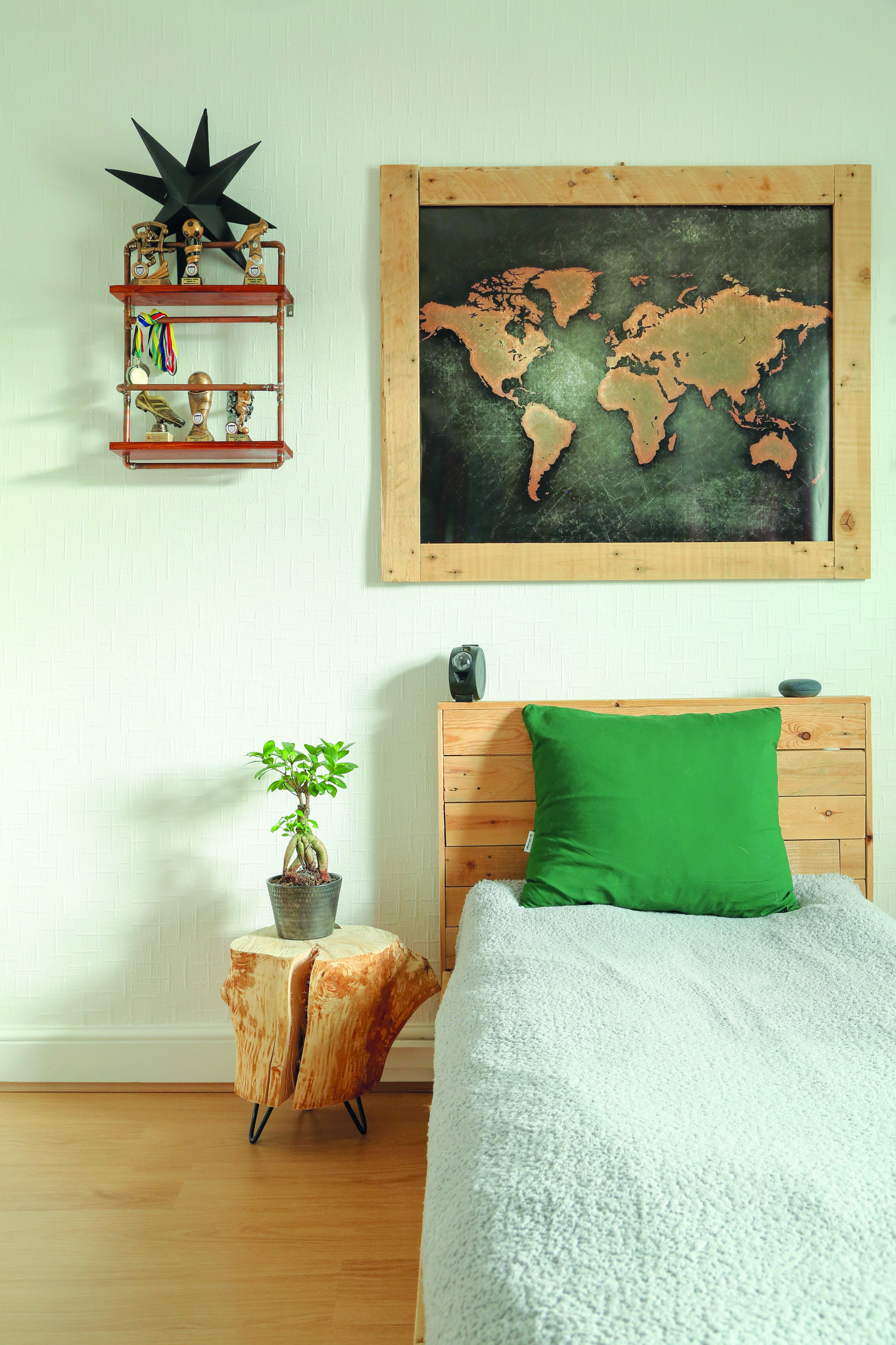 ‘Tomasz built David’s bed from planks of wood and made the shelving either side of his bed from copper pipes and wood scraps,’ Tosia says