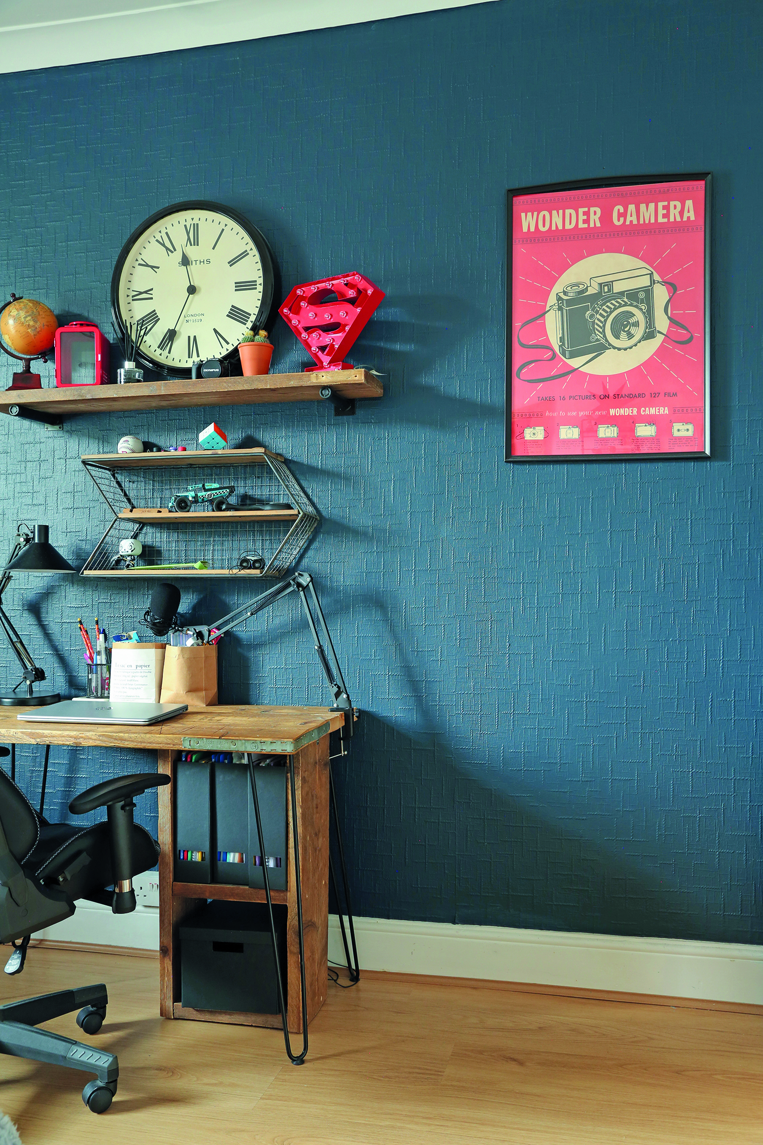 Not unlike the rest of the flat, David’s bedroom is full of repurposed finds and handmade treasures, such as the desk that Tomasz mad
