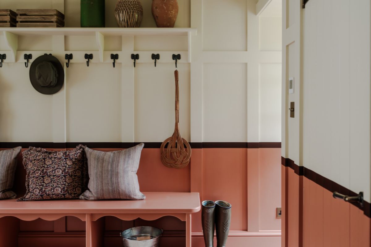Boot room with pink trim and cream uppers