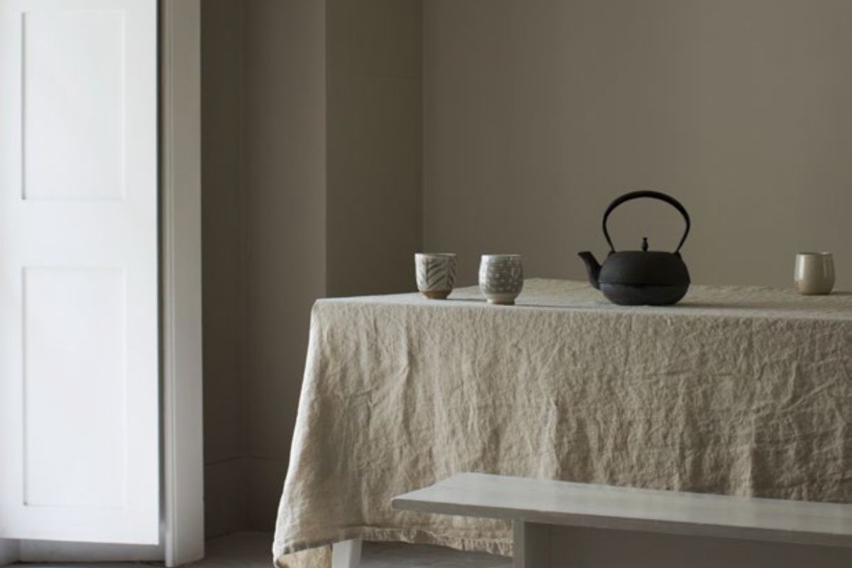 Walls painted in true matt emulsion in Lulling with table with objects on it 