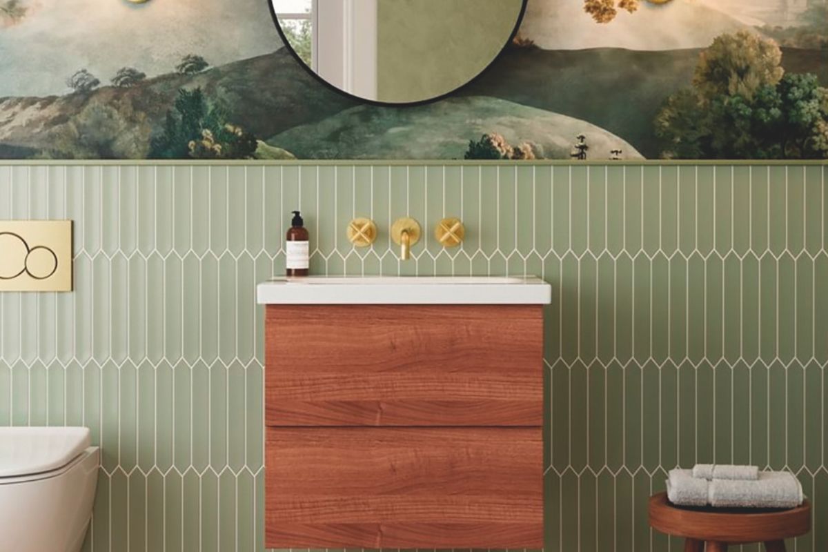 Bathroom unit with green tile background