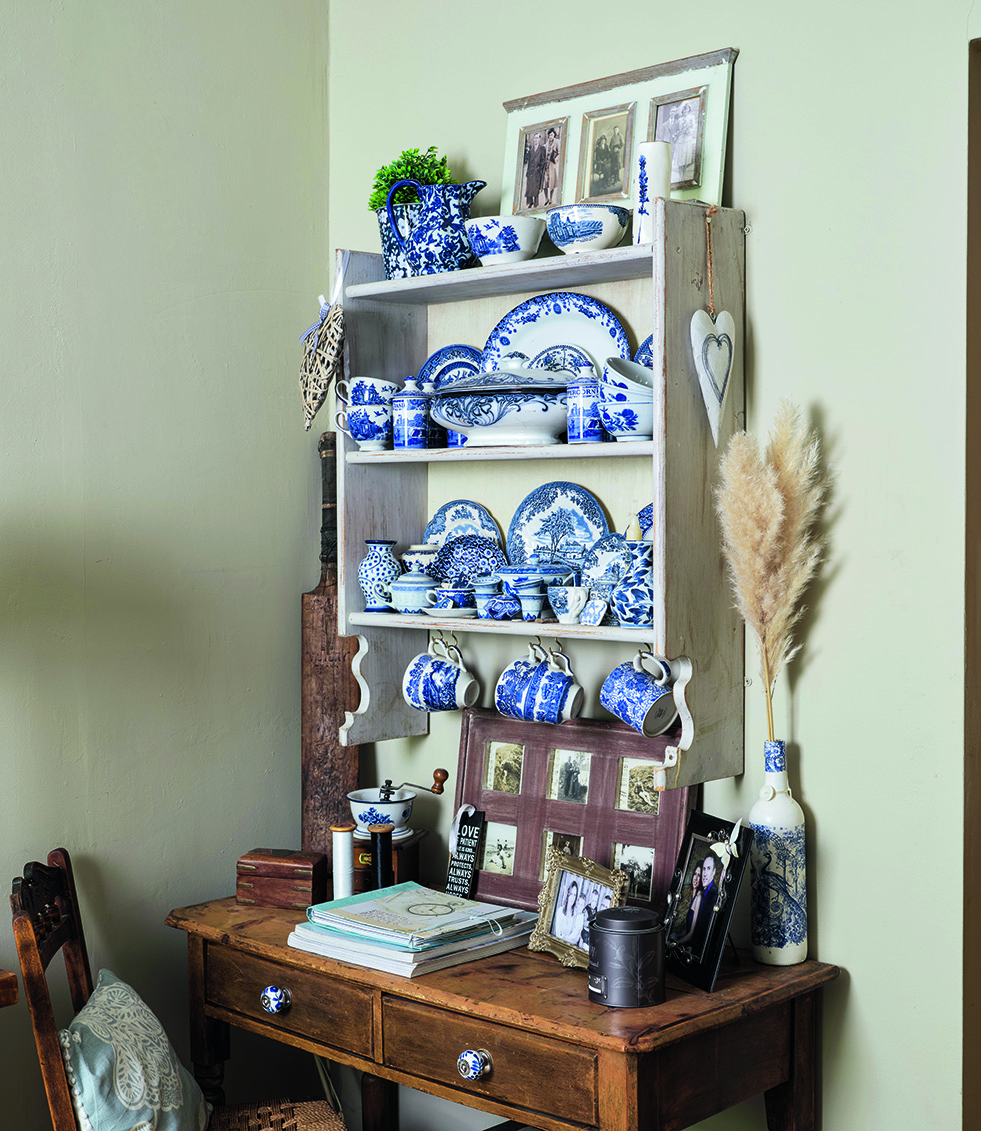 Ali’s talent for finding vintage gems means every corner is filled with eclectic treasures, from cricket bats to blue patterned china Ali’s talent for finding vintage gems means every corner is filled with eclectic treasures, from cricket bats to blue patterned china