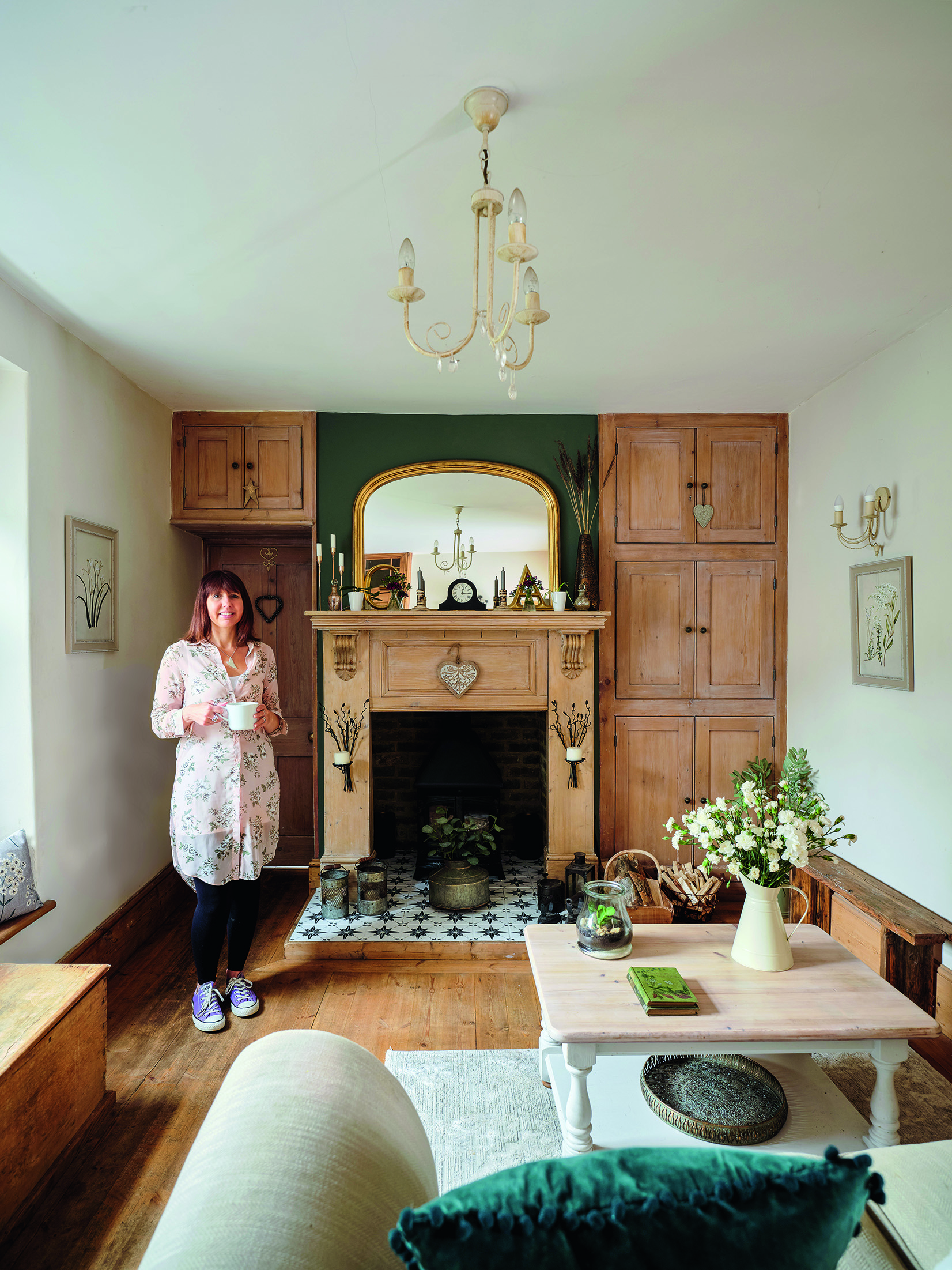 The couple have elevated existing features with DIY updates. ‘I wasn’t keen on the terracotta hearth tiles, so I painted them using a stencil,’ says Ali The couple have elevated existing features with DIY updates. ‘I wasn’t keen on the terracotta hearth tiles, so I painted them using a stencil,’ says Ali