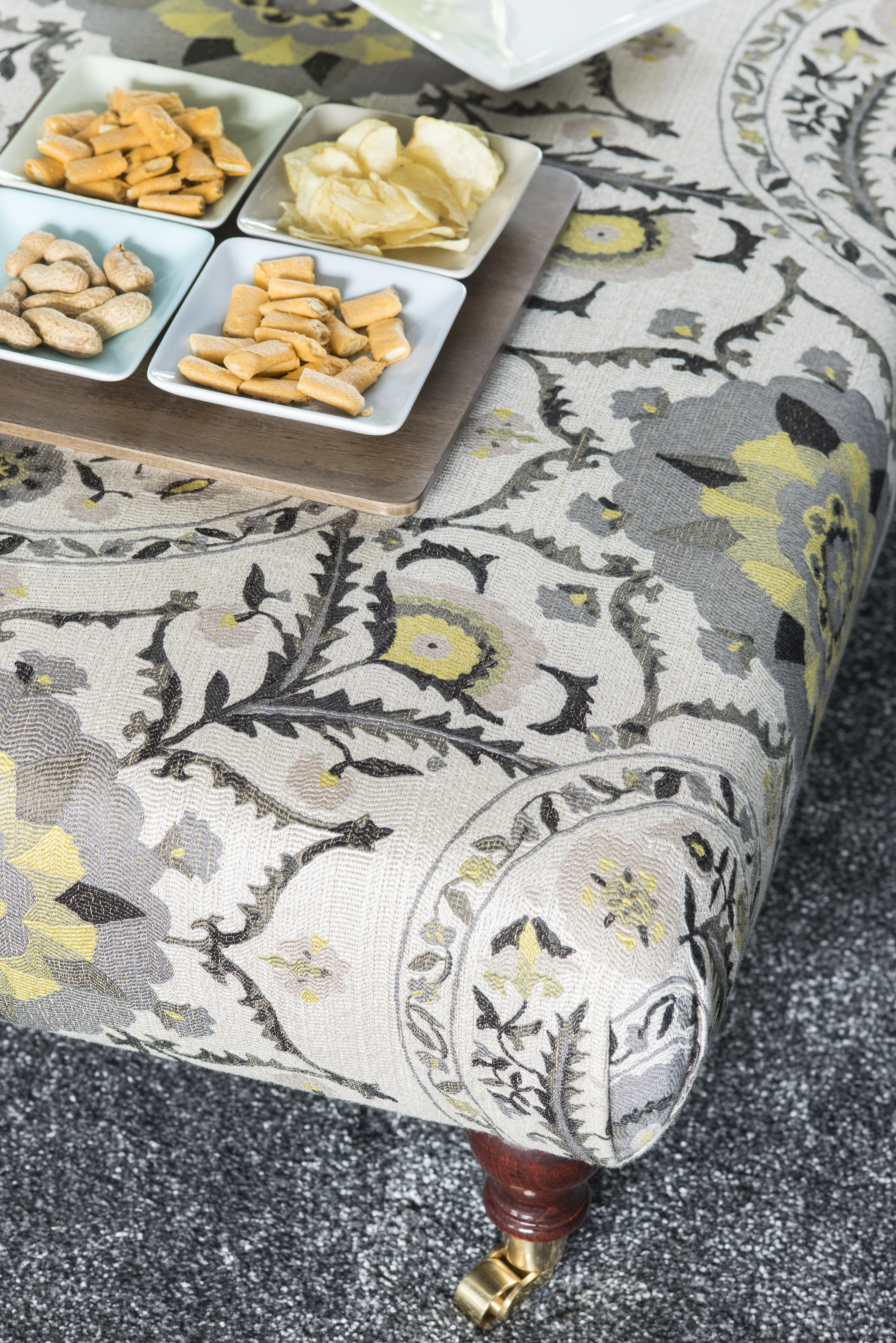 Good idea! Make more of a footstool by turning it into a small table for drinks and snacks – cover it in a fabric that matches the colour scheme to help tie it in with the rest of the décor. Good idea! Make more of a footstool by turning it into a small table for drinks and snacks – cover it in a fabric that matches the colour scheme to help tie it in with the rest of the décor