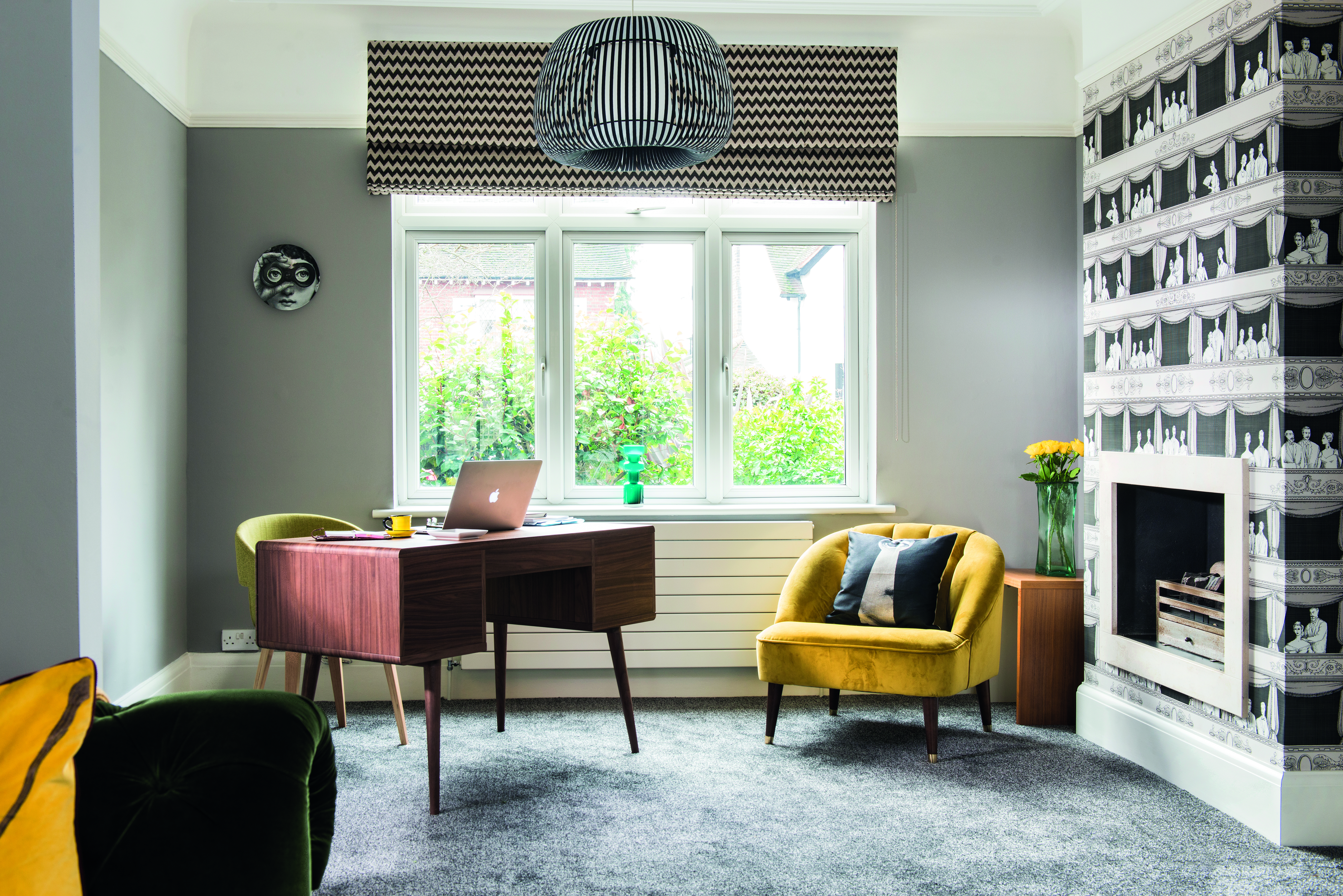 A contemporary desk in dark wood is Debra’s mini office – as it’s under the window, it’s a light, bright space to work in during the day A contemporary desk in dark wood is Debra’s mini office – as it’s under the window, it’s a light, bright space to work in during the day