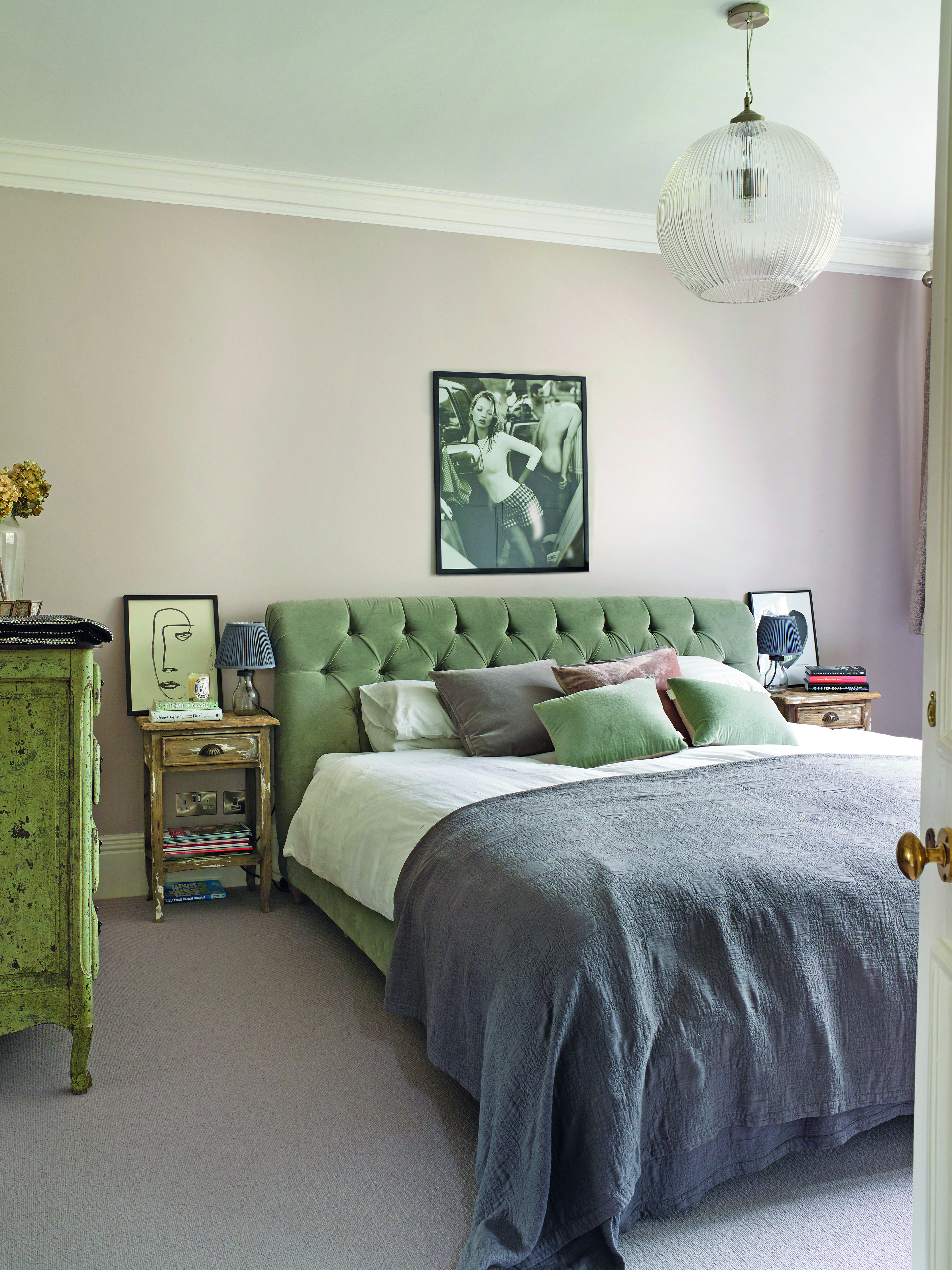 A pair of vintage bedside tables (£50 at a local antique market) sit either side of the sumptuous Dozer bed that’s dressed with velvet and linen cushions and a Nassau throw from Soho Home. Over the bed hangs a picture of Kate Moss by Mario Testino from East Urban Home at Wayfair A pair of vintage bedside tables (£50 at a local antique market) sit either side of the sumptuous Dozer bed that’s dressed with velvet and linen cushions and a Nassau throw from Soho Home. Over the bed hangs a picture of Kate Moss by Mario Testino from East Urban Home at Wayfair