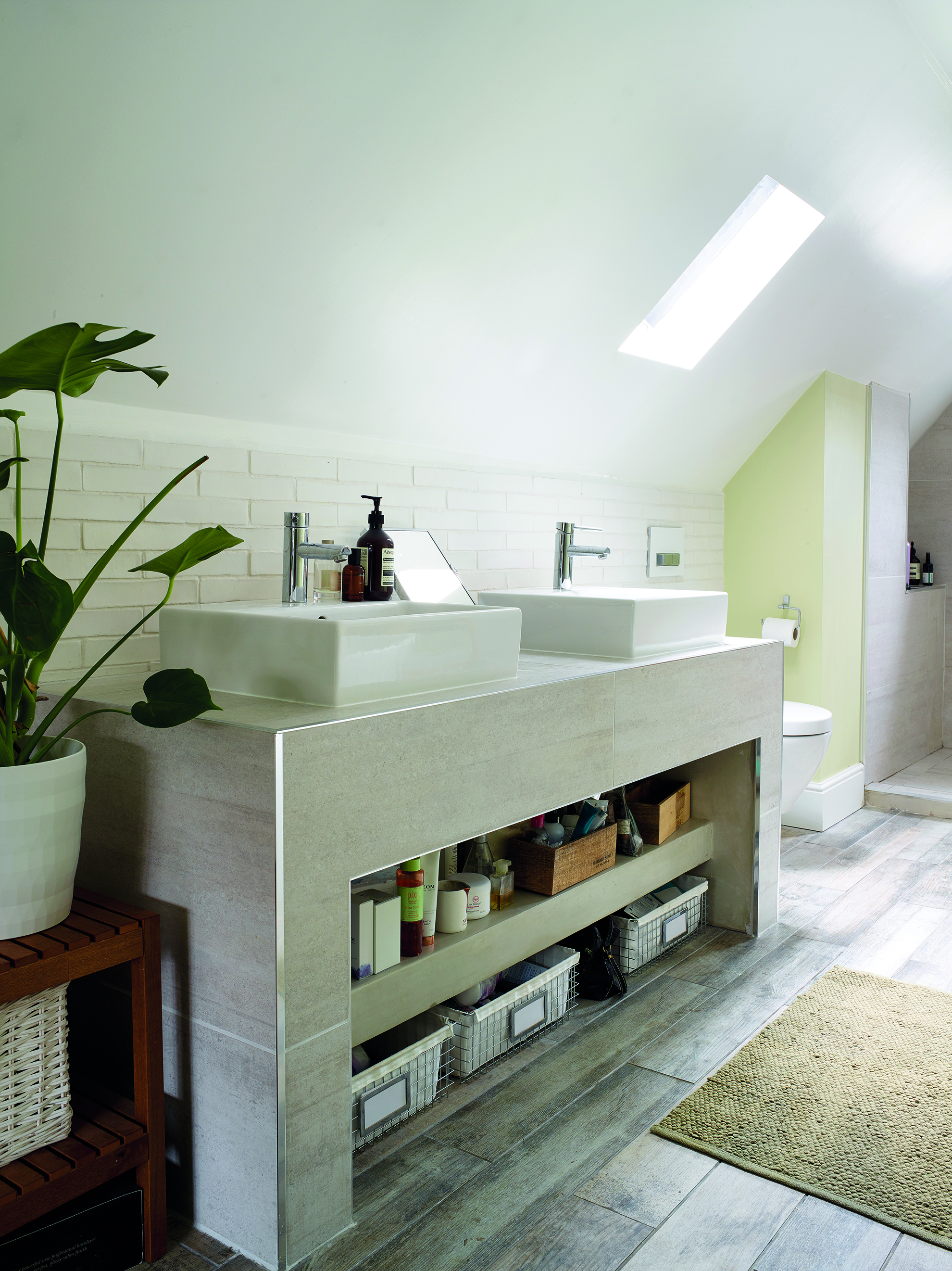 The Barcelona free-standing bath from Victoria + Albert Baths and the spacious walk-in shower screams luxury in the upstairs bathroom. Oak wood-effect tiles from Fired Earth and the Antheus wash basin by Villeroy & Boch finish off the luxe look The Barcelona free-standing bath from Victoria + Albert Baths and the spacious walk-in shower screams luxury in the upstairs bathroom. Oak wood-effect tiles from Fired Earth and the Antheus wash basin by Villeroy & Boch finish off the luxe look