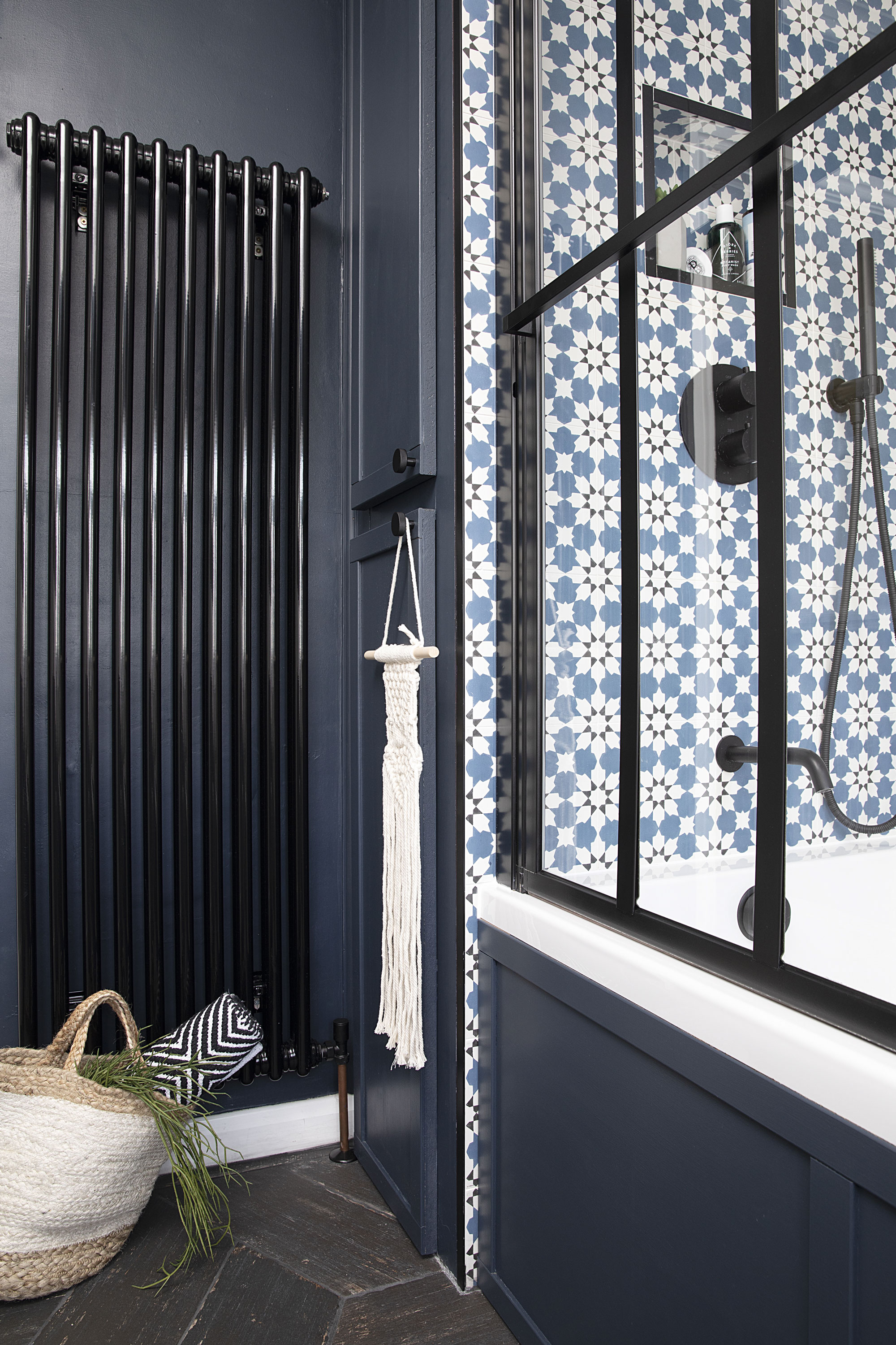 The couple originally wanted a separate shower enclosure, but it would’ve meant a small bath. Instead, they made the old cupboard narrower to allow for a larger tub