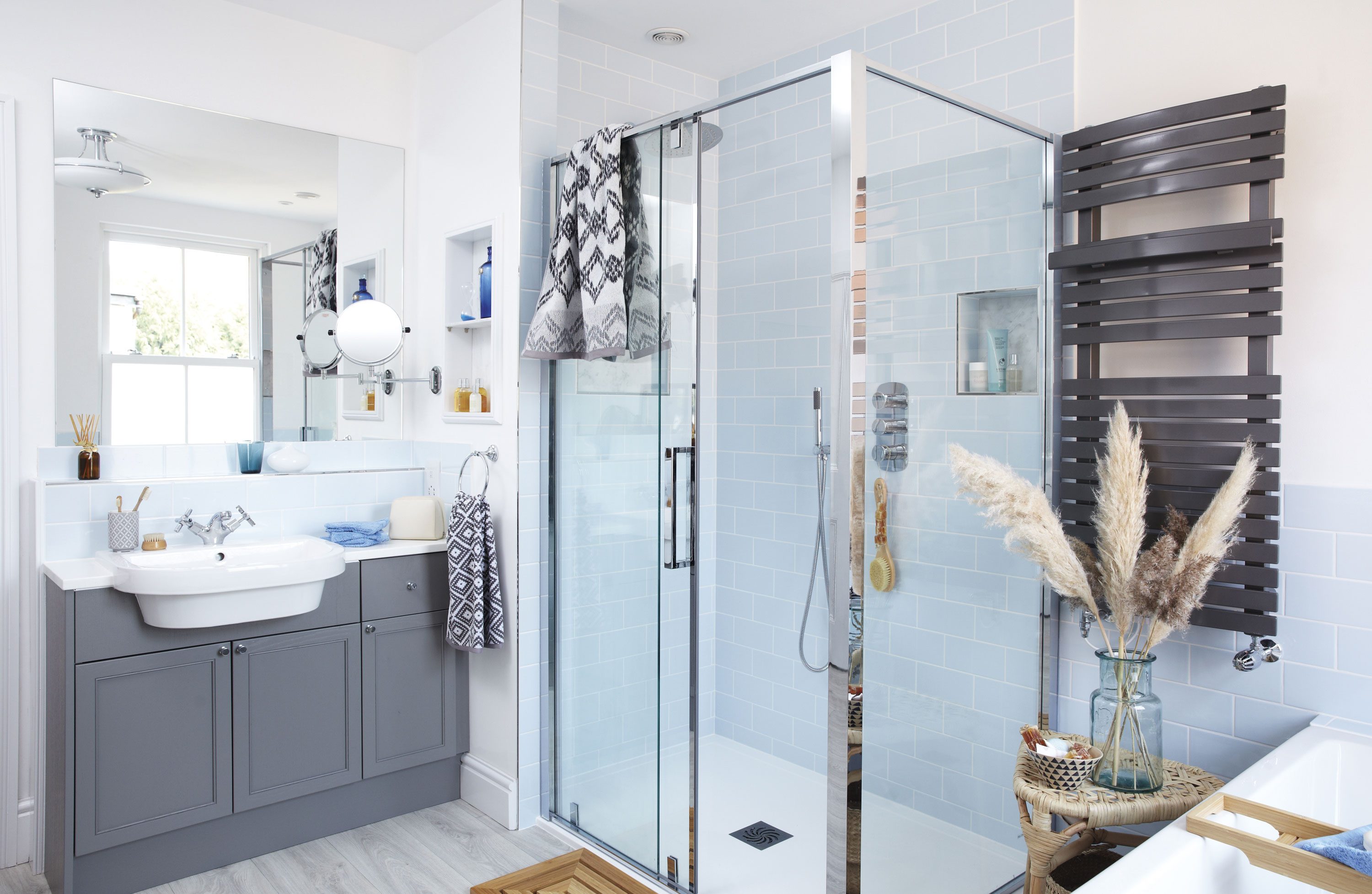 Moving rooms enabled Laura and Graham to install a shower enclosure, while the addition of a vanity unit with generous storage, mirror and plenty of work-surface, has also proved a winning combination in this busy family bathroom Moving rooms enabled Laura and Graham to install a shower enclosure, while the addition of a vanity unit with generous storage, mirror and plenty of work-surface, has also proved a winning combination in this busy family bathroom