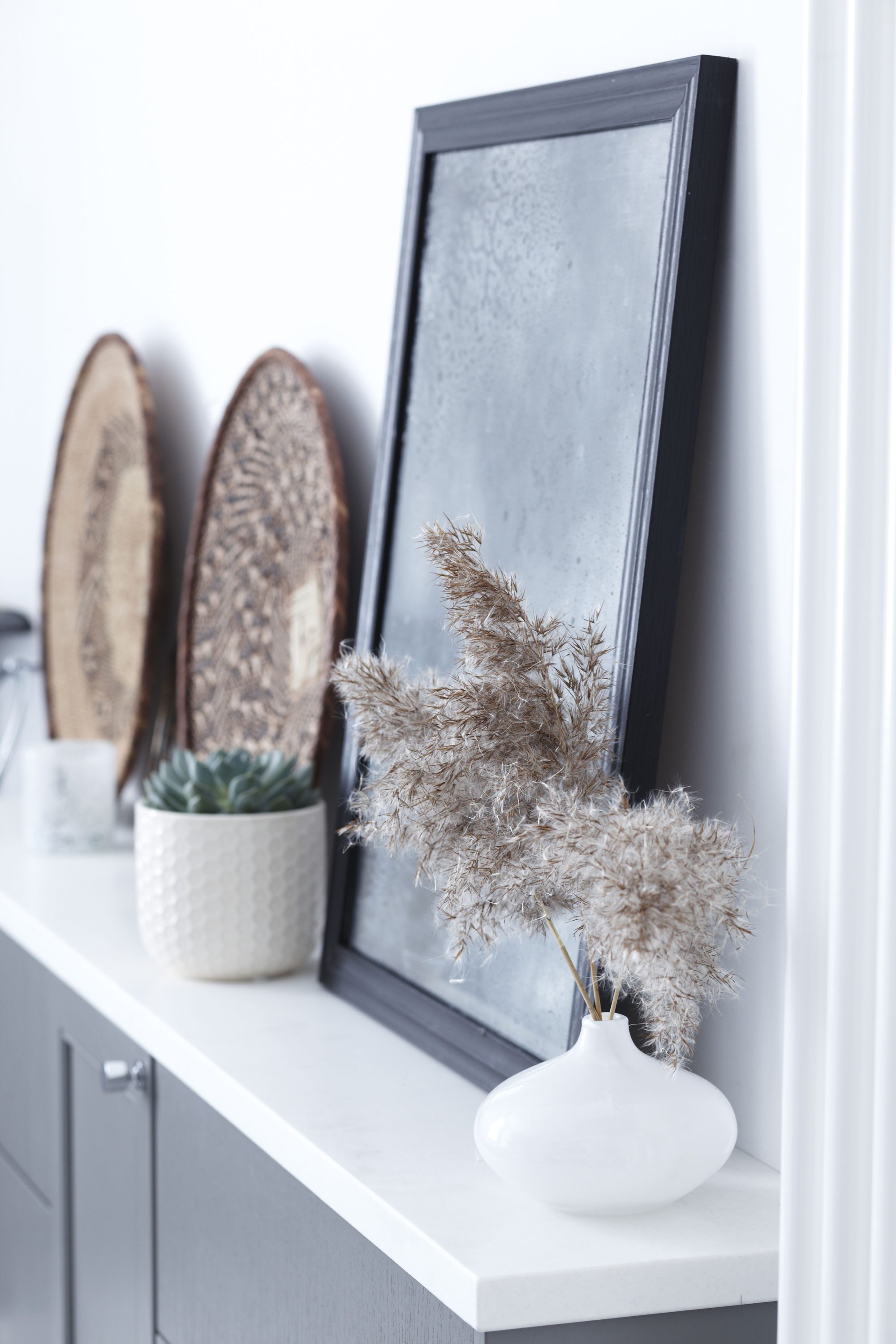 A collection of holiday souvenirs and second-hand finds add a personal touch to this much-used room A collection of holiday souvenirs and second-hand finds add a personal touch to this much-used room