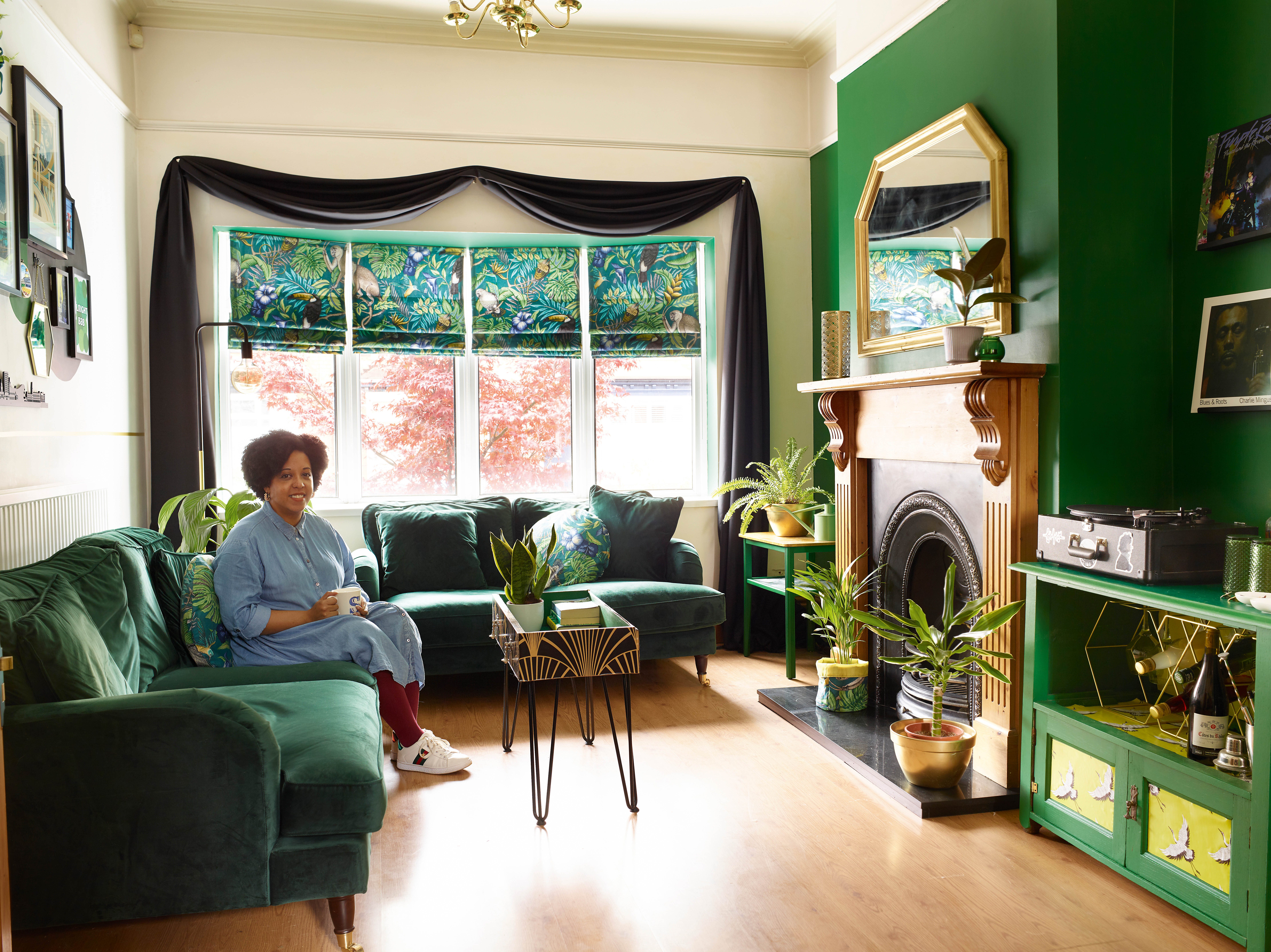 Sabrina's home250392v1 Sabrina in her green living room