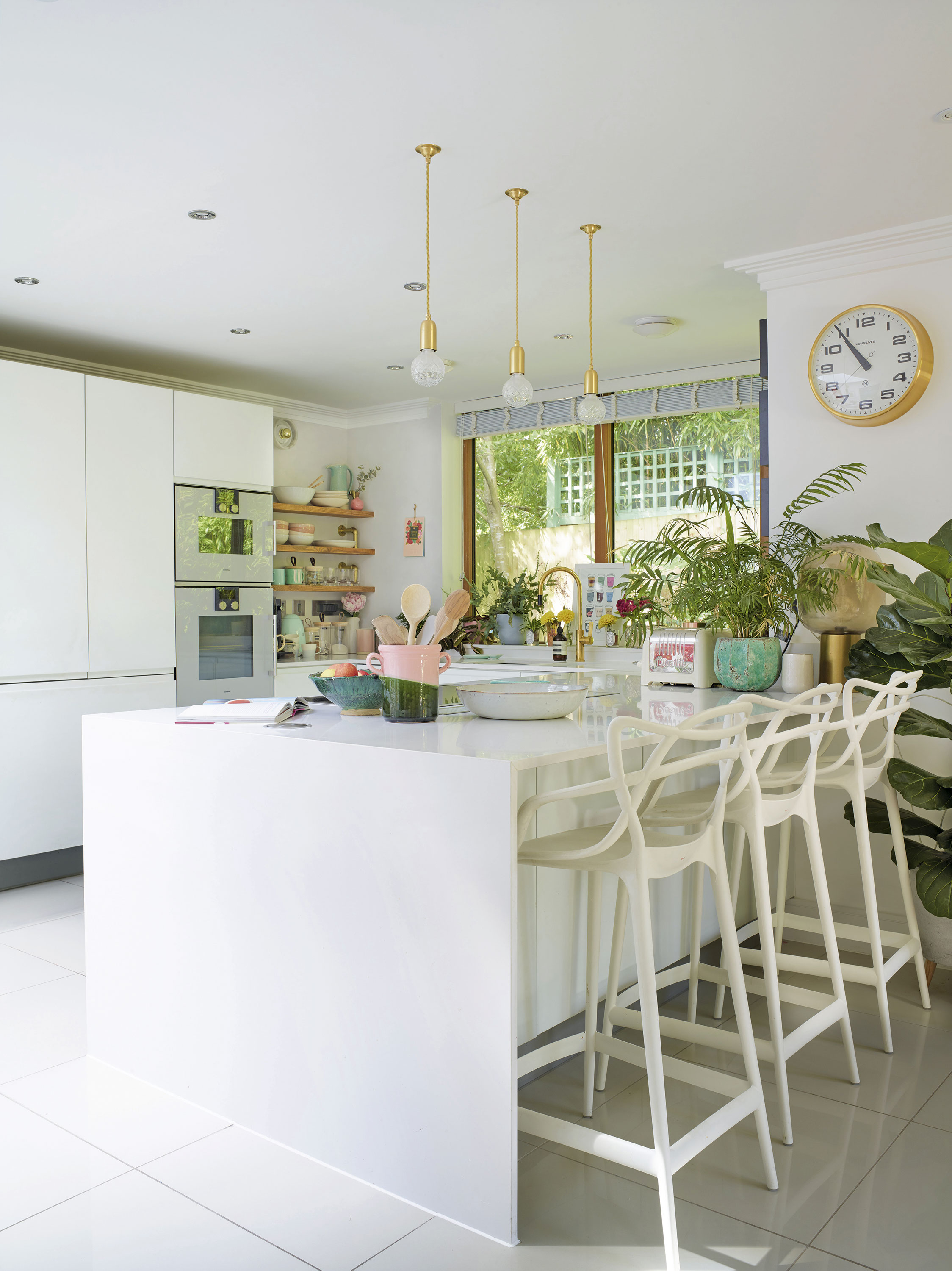 ‘The kitchen is the heart of the home for us, same as most people. I love this airy, breezy open-plan living space that allows me to be in the kitchen while the kids are playing right next to me in the lounge area,’ says Sam ‘The kitchen is the heart of the home for us, same as most people. I love this airy, breezy open-plan living space that allows me to be in the kitchen while the kids are playing right next to me in the lounge area,’ says Sam