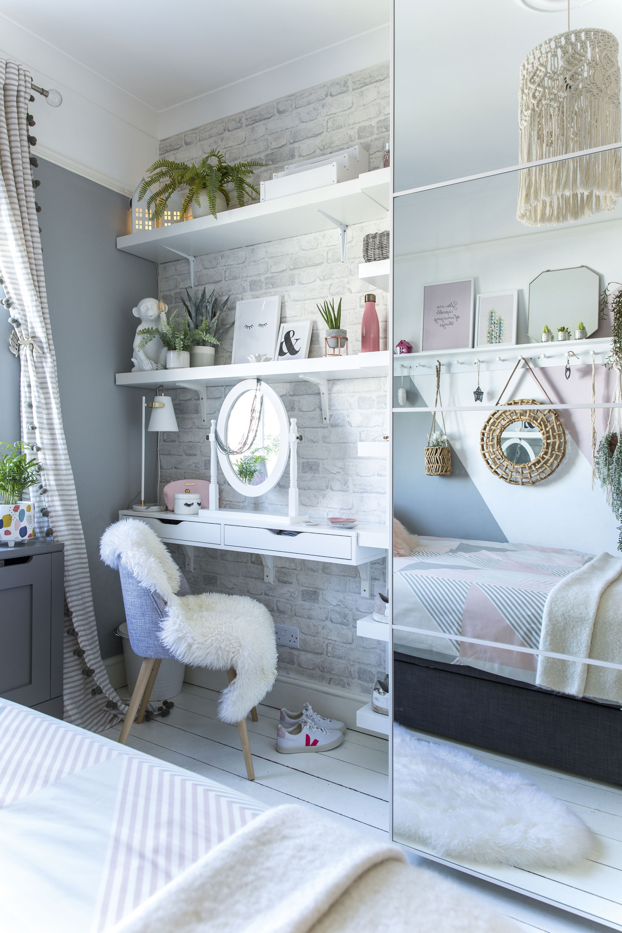 A wall-mounted shelf doubles up as a dressing table and is surrounded with shelves for all of Marilena’s trinkets, while the brick-effect wallpaper adds texture and detail
