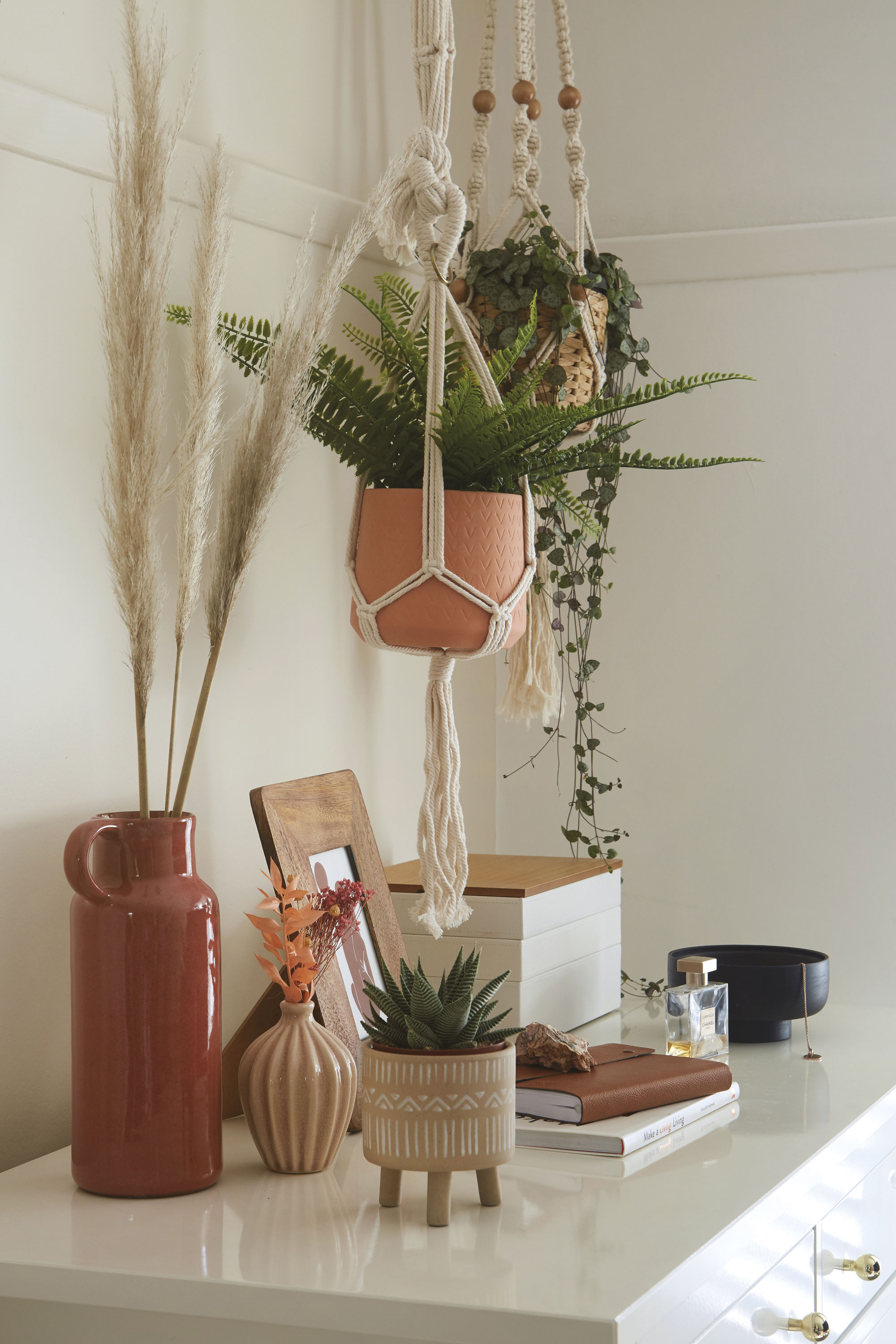 'I love natural textures and I think some of the bits I’ve chosen – such as the fringed wall hanging, woven baskets and macramé plant hangers – add a relaxed boho touch' says Laurie 'I love natural textures and I think some of the bits I’ve chosen – such as the fringed wall hanging, woven baskets and macramé plant hangers – add a relaxed boho touch' says Laurie