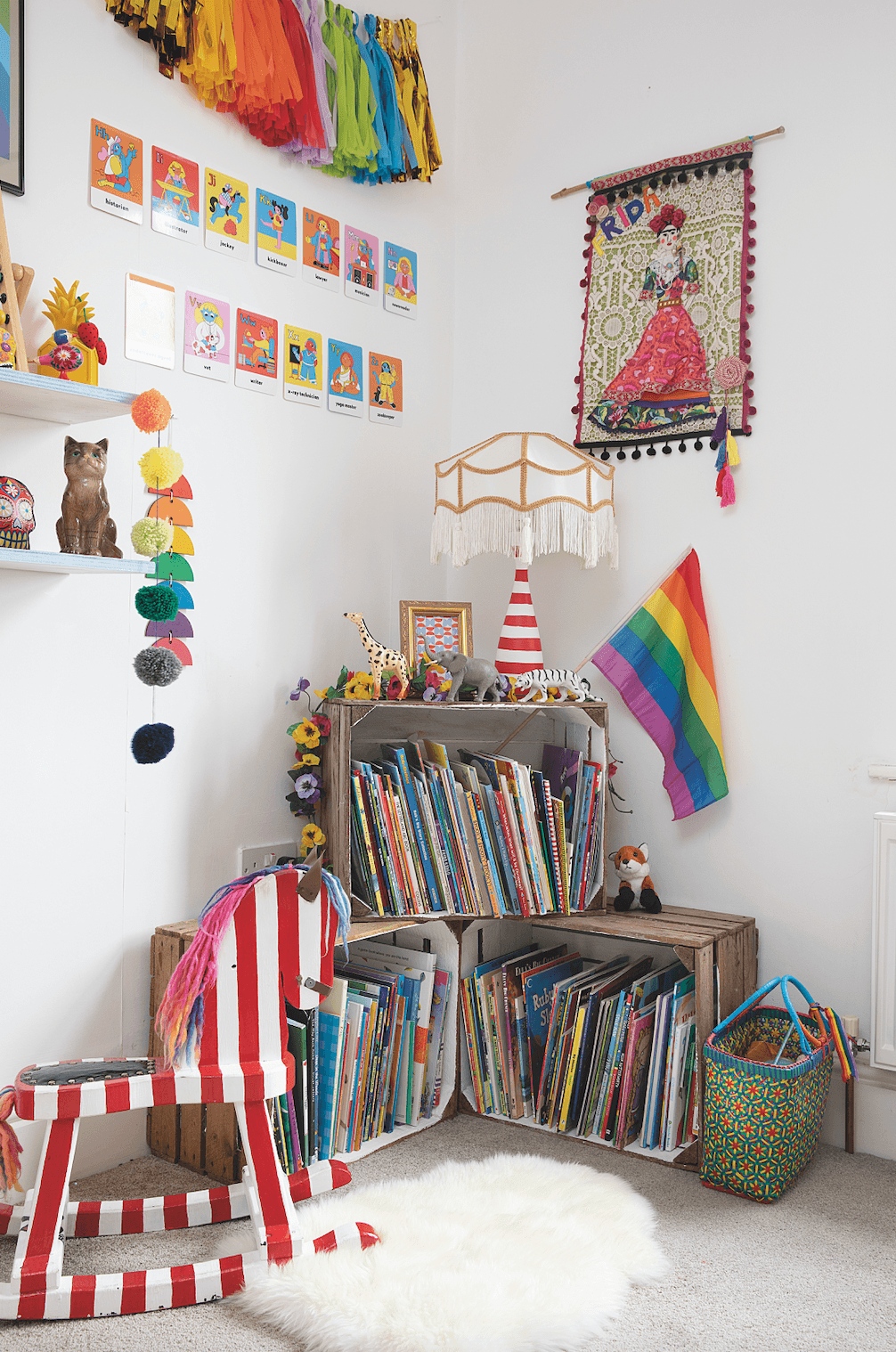 A bookcase has been made from vintage apple crates, which Suzy and Iain originally sourced for their wedding and have re-used in different ways in various rooms over the years. As Frida is named after Frida Kahlo, Suzy created a fabric wall hanging of the artist before she was born. It’s made from felt, lace, vintage brooches and some inherited gold and emerald earrings Bedroom makeover: 'Getting creative on a budget is my passion'