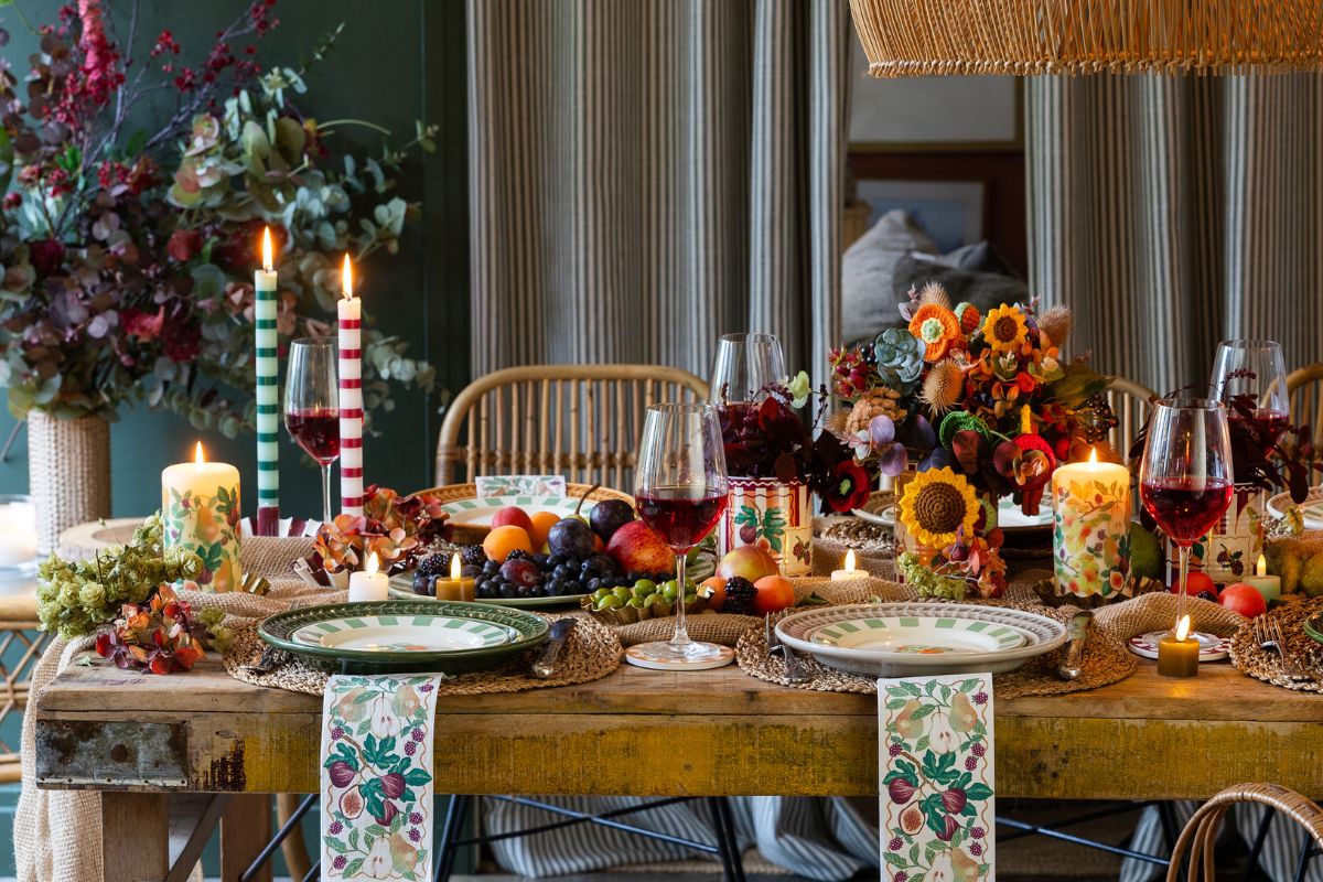 A busy table with lots of glasses and accessories