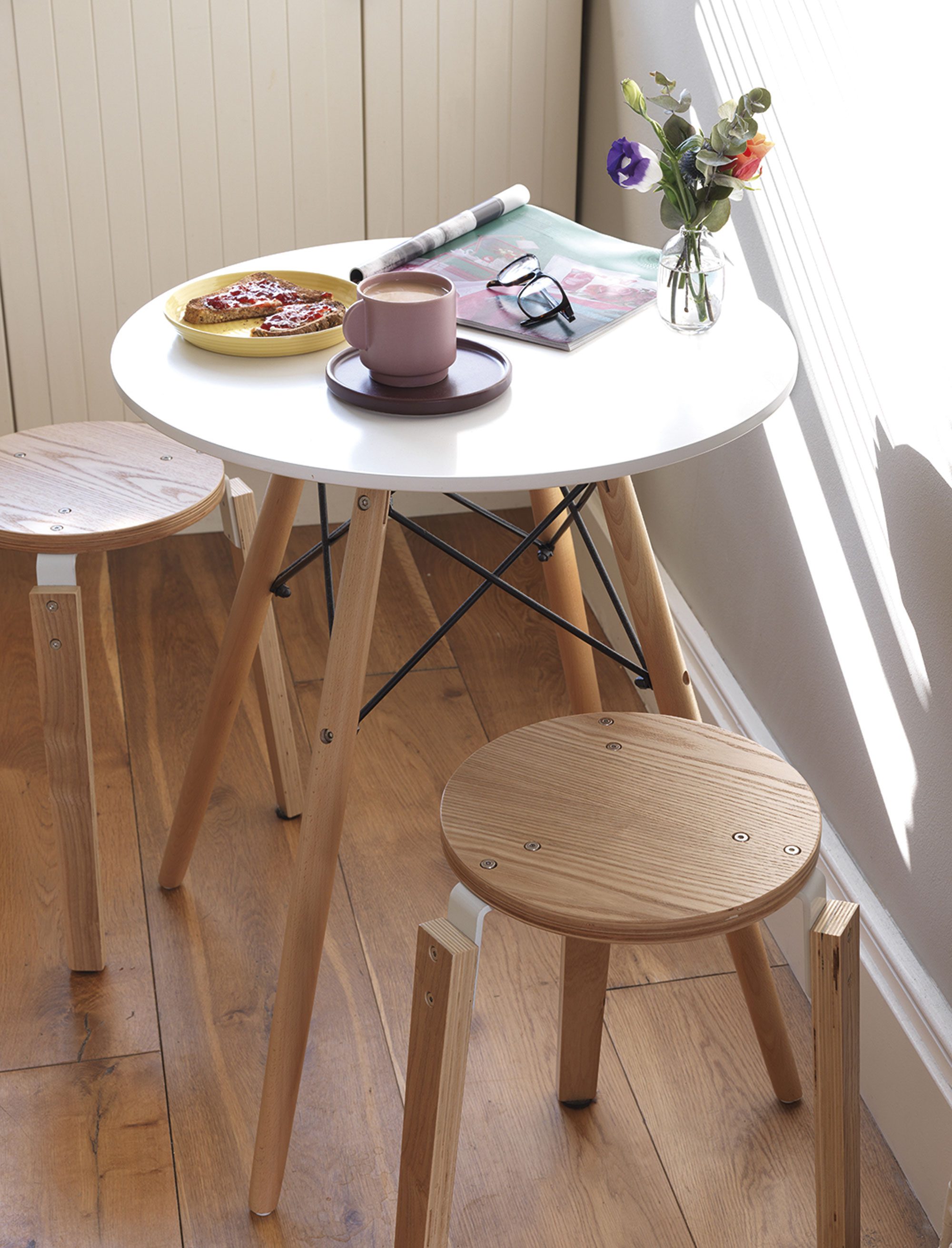‘I bought this little bistro table before we moved in. I saw it had been reduced at Cox & Cox so snapped it up. I love sitting here, enjoying a coffee and reading through the papers at the weekend, with the sun streaming through the window,’ says Emily ‘I bought this little bistro table before we moved in. I saw it had been reduced at Cox & Cox so snapped it up. I love sitting here, enjoying a coffee and reading through the papers at the weekend, with the sun streaming through the window,’ says Emily