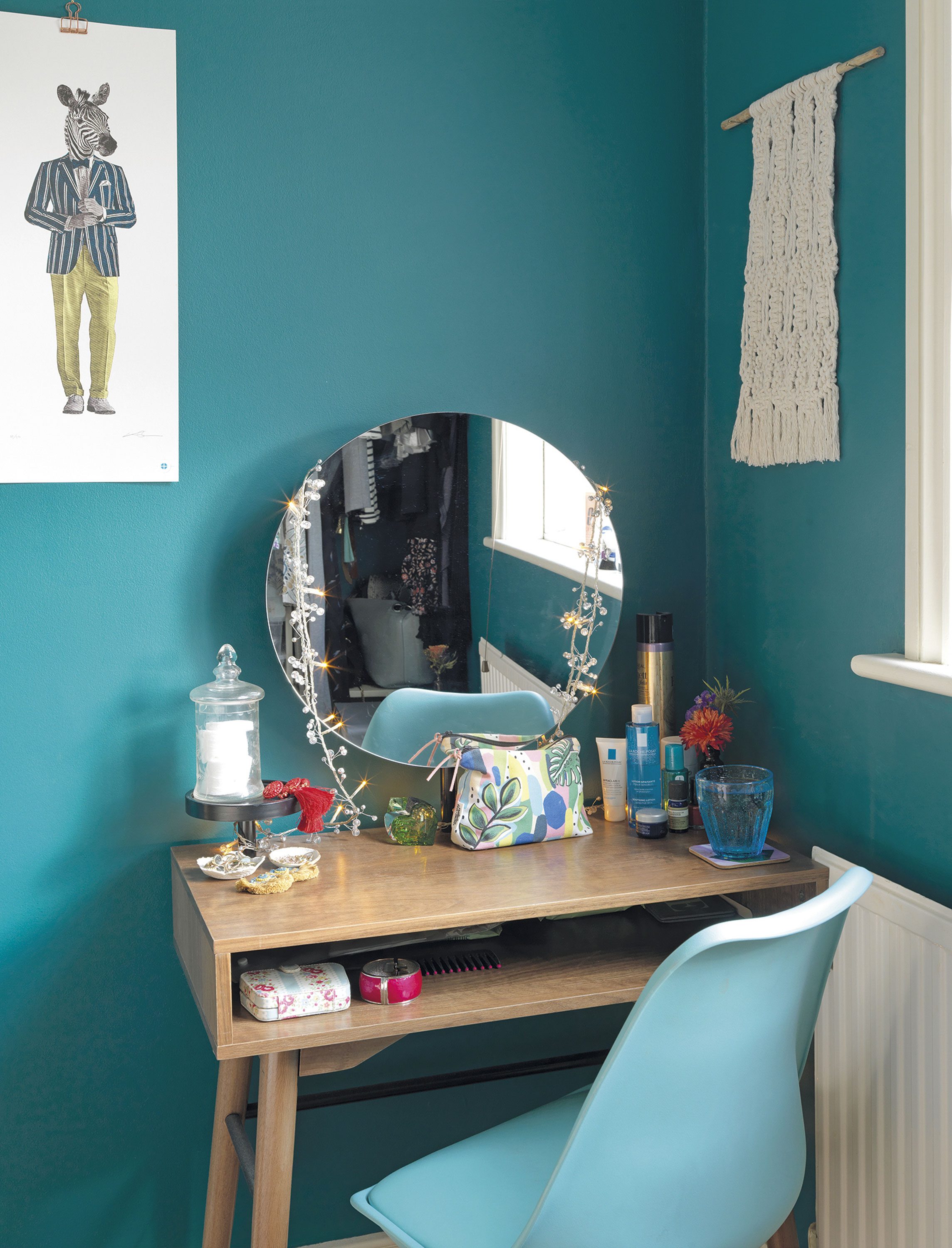 ‘I recently got rid of my shabby chic dressing table and bought this modern alternative. I think the dark wood sits perfectly with the green walls.’ Emily bought the zebra print by Kerry Eggleton from a local art fair. ‘It was a second, so I got a real bargain’ ‘I recently got rid of my shabby chic dressing table and bought this modern alternative. I think the dark wood sits perfectly with the green walls.’ Emily bought the zebra print by Kerry Eggleton from a local art fair. ‘It was a second, so I got a real bargain’