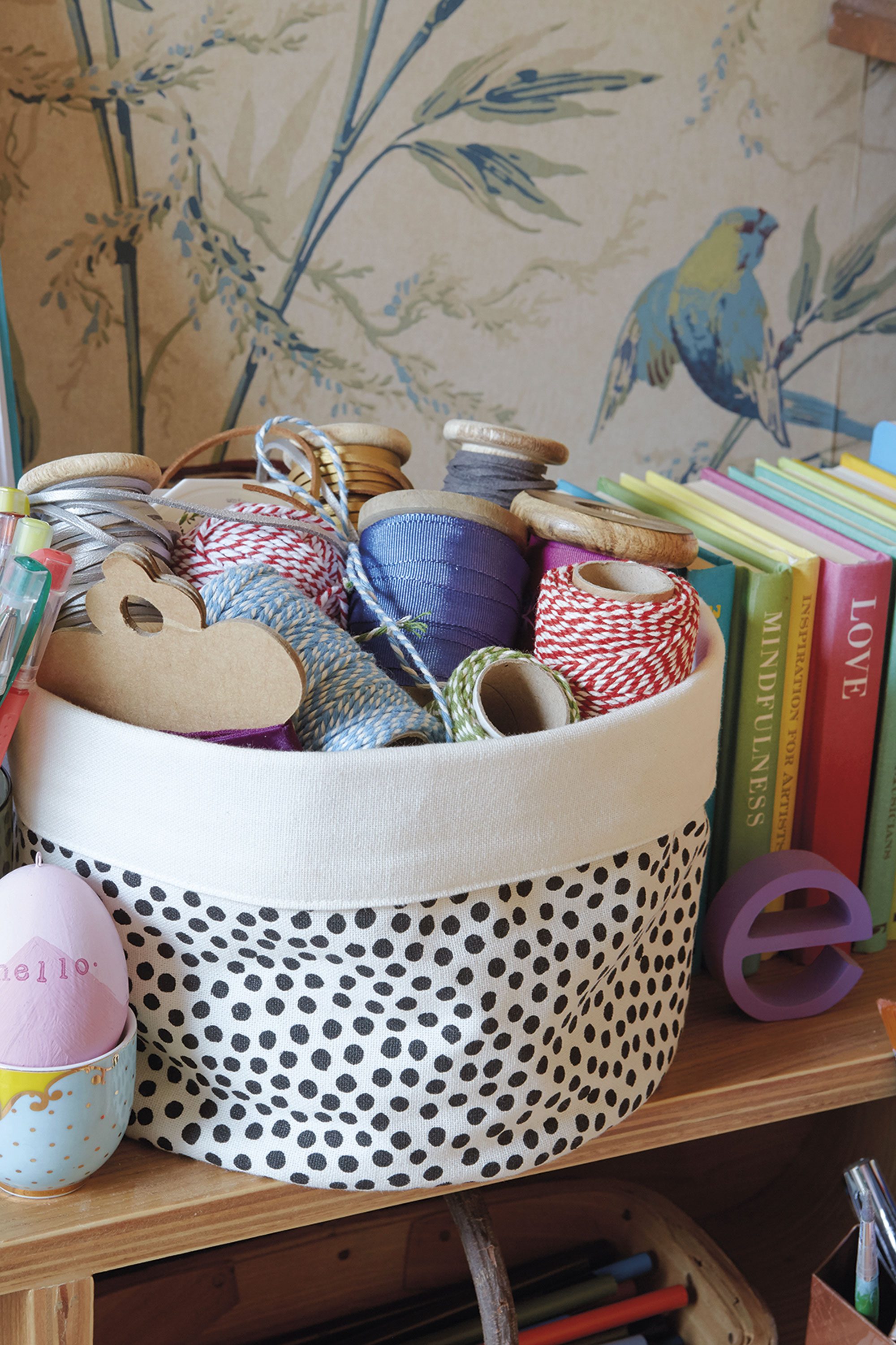 Storage is a top priority in Emily’s craft room. ‘I don’t want to hide everything away in boxes, so things like ribbons and twine need to be seen. Displaying them in this fabric basket from H&M Home is ideal – pretty and practical’ Storage is a top priority in Emily’s craft room. ‘I don’t want to hide everything away in boxes, so things like ribbons and twine need to be seen. Displaying them in this fabric basket from H&M Home is ideal – pretty and practical’