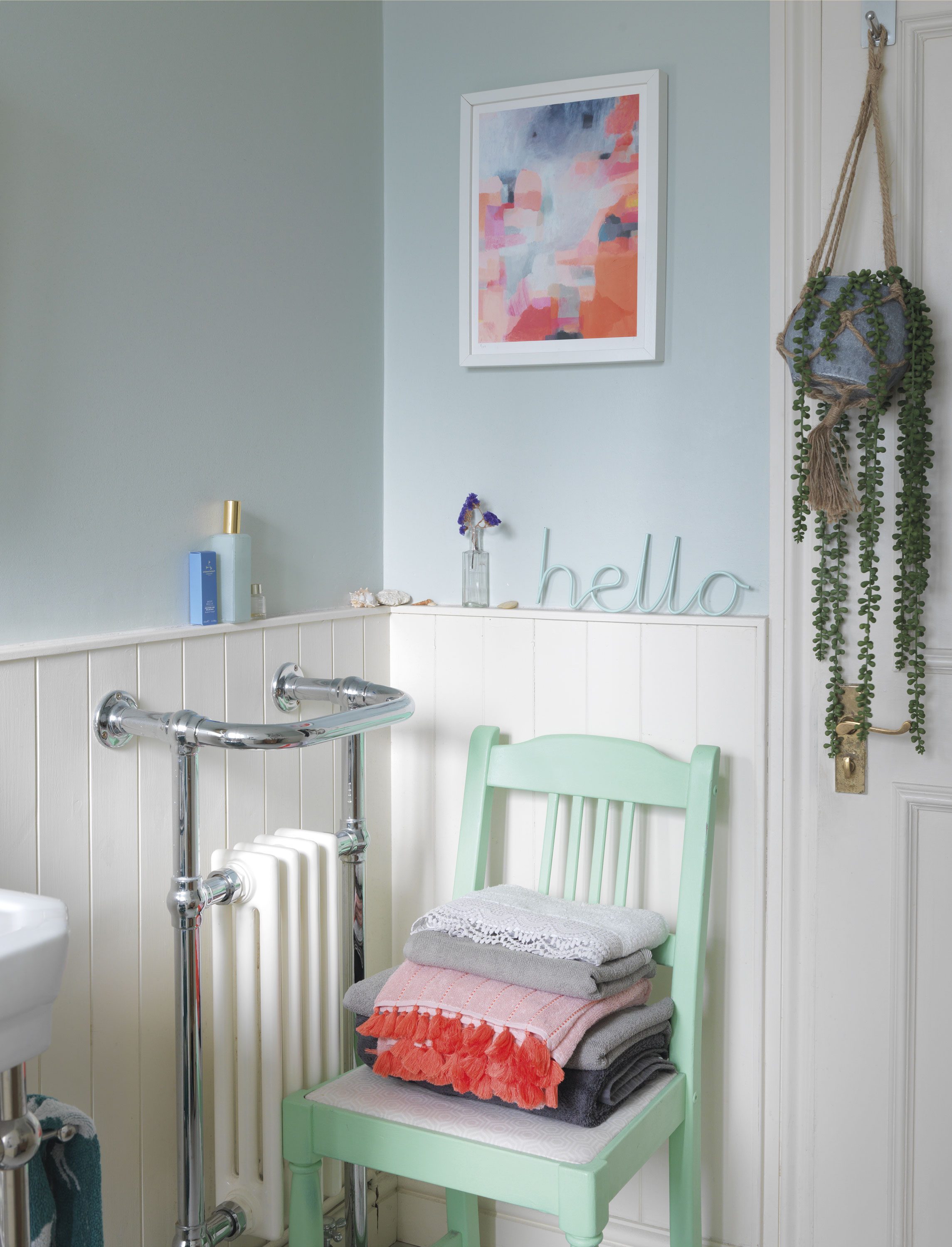 A quaint little chair sits in the corner of Emily’s bathroom. Painted in mint green, it’s another of her upcycling projects. ‘It makes an ideal spot for stacking the towels, only the pretty ones though!’ The colours reflect those of the artwork above, another one of Jessica Ford’s A quaint little chair sits in the corner of Emily’s bathroom. Painted in mint green, it’s another of her upcycling projects. ‘It makes an ideal spot for stacking the towels, only the pretty ones though!’ The colours reflect those of the artwork above, another one of Jessica Ford’s