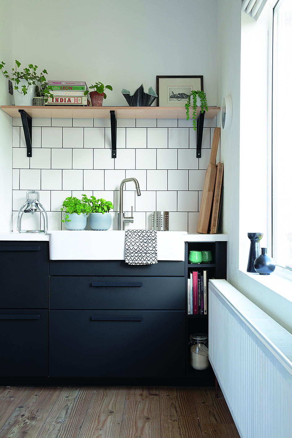 By reusing the sink and shelf brackets from their previous kitchen, the couple were able to save money. ‘Being eco-friendly is very important to us,’ says Margy. ‘We’ve also saved money by keeping the same flooring and our old dining table, which is made from reclaimed scaffold boards.’ By reusing the sink and shelf brackets from their previous kitchen, the couple were able to save money. ‘Being eco-friendly is very important to us,’ says Margy. ‘We’ve also saved money by keeping the same flooring and our old dining table, which is made from reclaimed scaffold boards.’