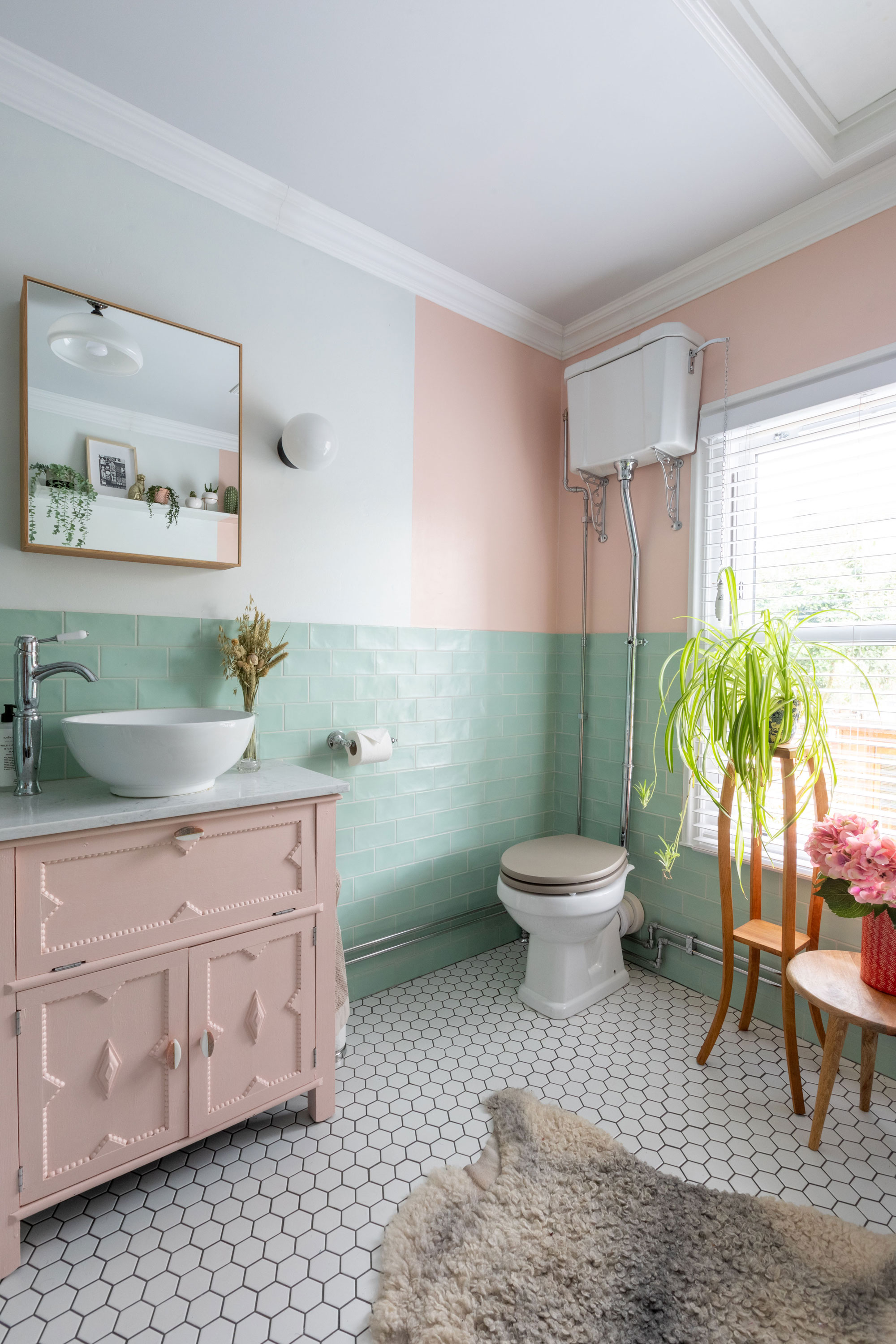 'Renovating gave us a blank canvas for our colourful, creative home' Rather than buying a ready-made sink unit, try a budget-friendly, DIY solution. Carey made hers from an old cupboard and it’s now the centrepiece of her vintage-inspired scheme