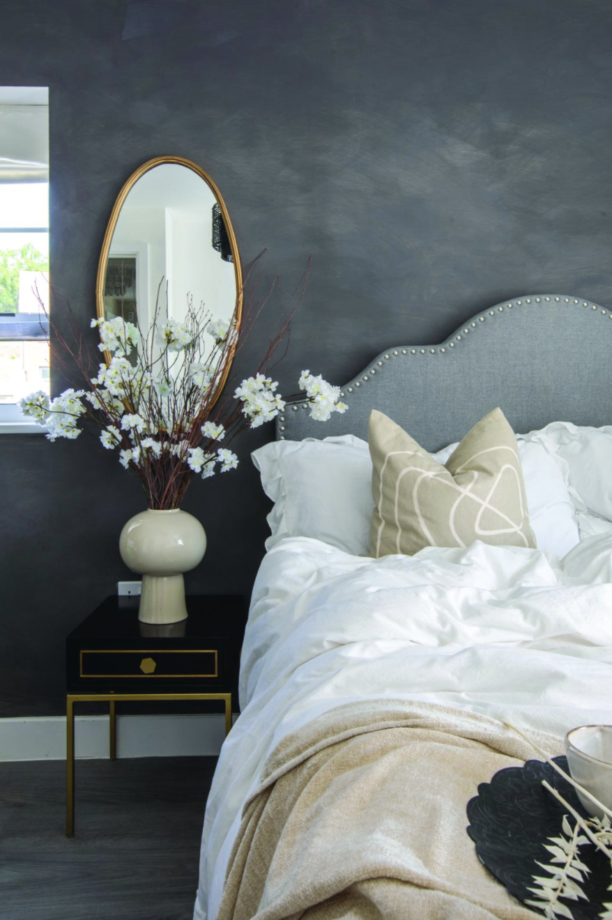 Black side tables from Swoon and walls in Slate limewash paint by Bauwerk create a dramatic scheme, which Yooni styled with artificial cherry blossom to soften the look Black side tables from Swoon and walls in Slate limewash paint by Bauwerk create a dramatic scheme, which Yooni styled with artificial cherry blossom to soften the look