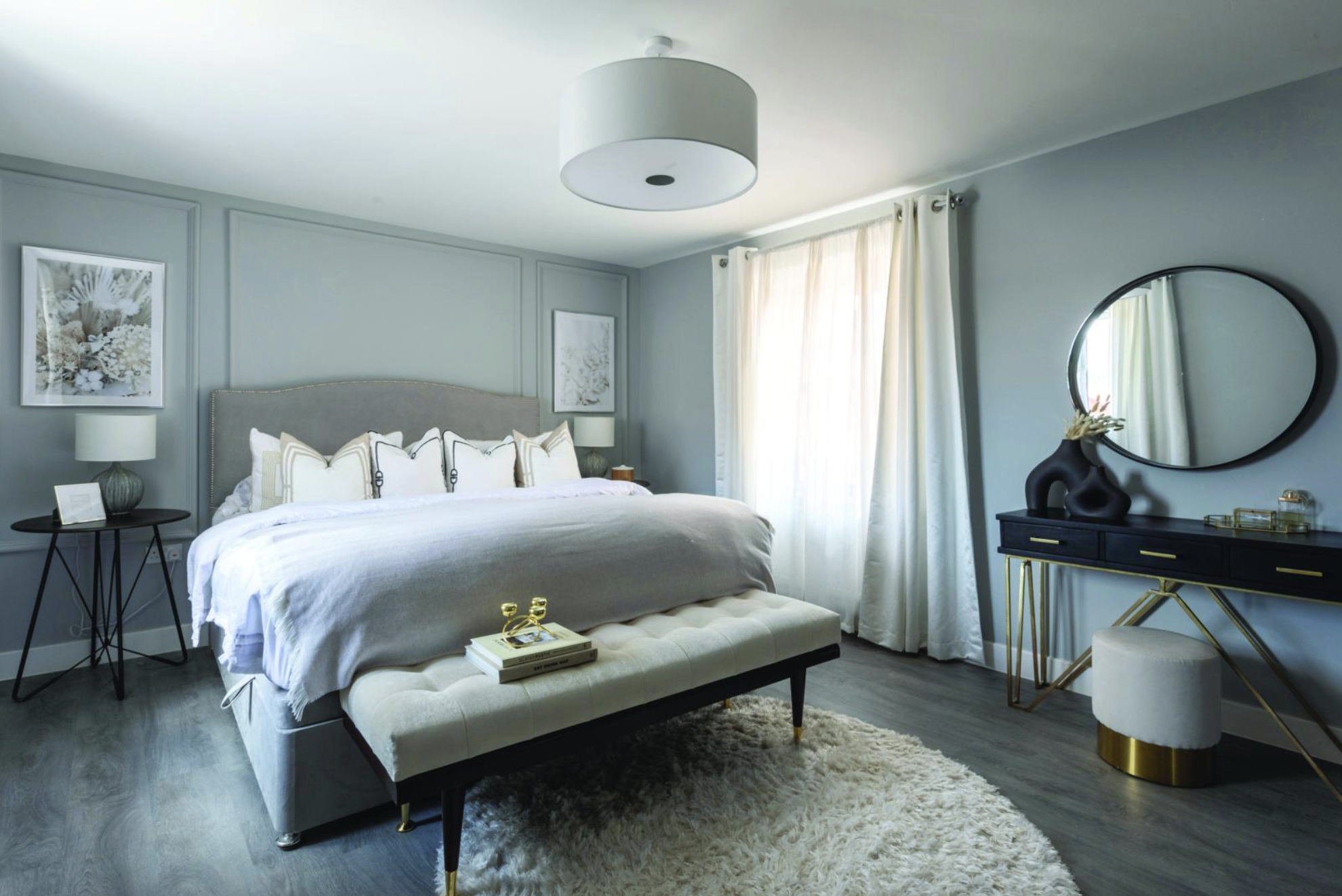 Contrasting greys and neutrals with black and gold accents creates a plush feel in the main bedroom. Dulux’s Light Rain and layered putty and cream textiles create a sophisticated hotel vibe Contrasting greys and neutrals with black and gold accents creates a plush feel in the main bedroom. Dulux’s Light Rain and layered putty and cream textiles create a sophisticated hotel vibe