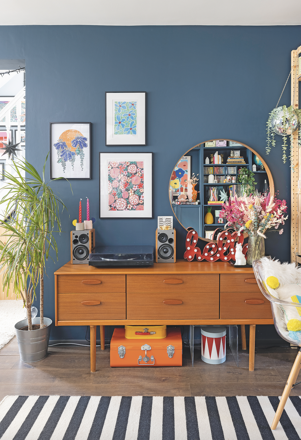 ‘I love vintage furniture and the history it holds, and this cabinet, which was left on the street, was a great find. I was on my way to work, but I thought, if it’s still there on my way home, it’s meant to be! I love seeing our things on show; even the edges of the records have fun colours, so we embraced the idea of open storage to showcase all our colourful collections and accessories’ ‘I love vintage furniture and the history it holds, and this cabinet, which was left on the street, was a great find. I was on my way to work, but I thought, if it’s still there on my way home, it’s meant to be! I love seeing our things on show; even the edges of the records have fun colours, so we embraced the idea of open storage to showcase all our colourful collections and accessories’