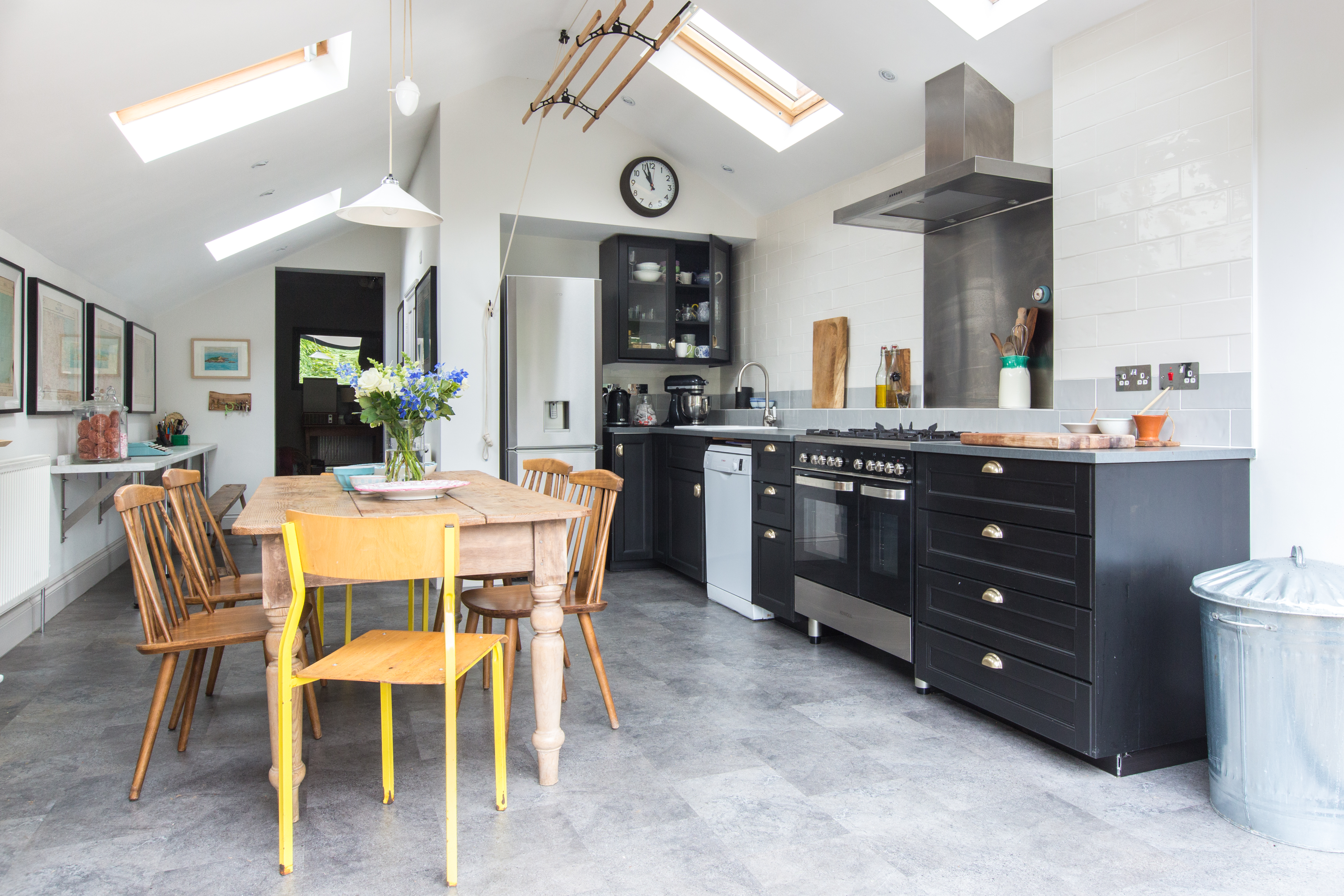 Kitchen To reduce cost, Lily kept the support walls for the bathroom upstairs, which marks the original external wall of the kitchen. A space-saving clothes pulley tucks away overheadmakeover - Lily Coles' Reading Victorian Terrace Kitchen makeover - Black modern kitchen with skylights
