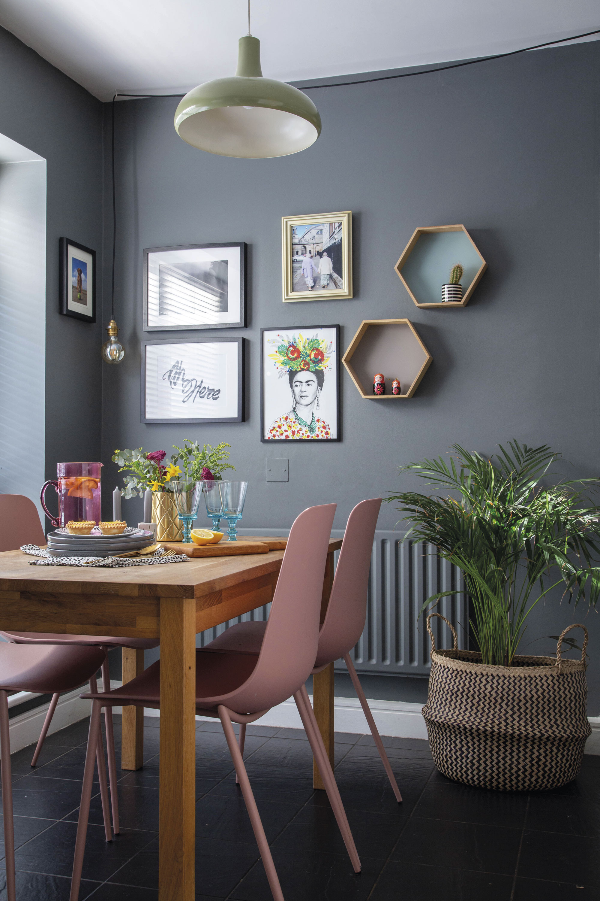 In the kitchen, pastels give the grey and white scheme a cheery and playful edge