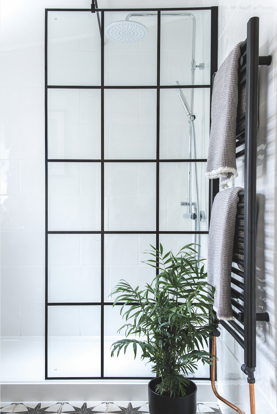 The Crittall-window style shower screen is the focal point of the room and was one of the must-have items on Lorna and James’s wish list. They bought it in a sale for a fraction of the usual price Bathroom makeover: 'Our bathroom feels like a mini boutique hotel'