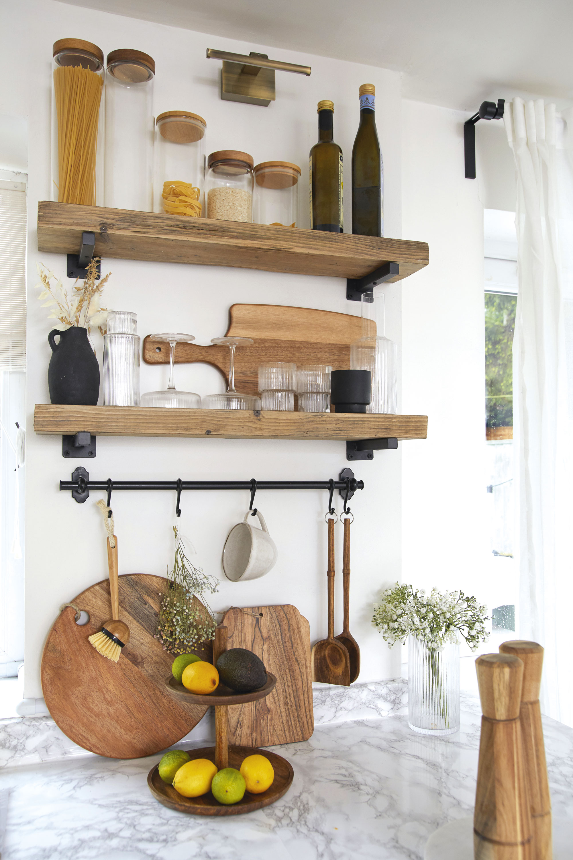 'DIY hacks have saved us a fortune' ‘Making your own scaffold shelves out of spare wood is so easy; you just need to invest in the tools. I cut them to size, sanded and varnished the wood and then hung them on brackets’