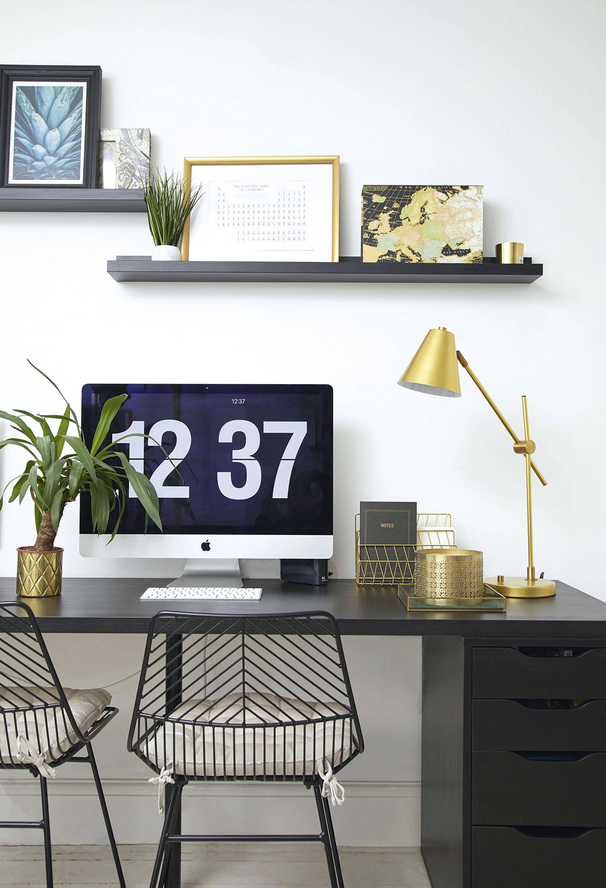 ‘I love unique accessories, and adding luxe gold and black touches, like this lamp from HomeSense, and the chairs from Dunelm, has made this simple office area a lovely place to work’