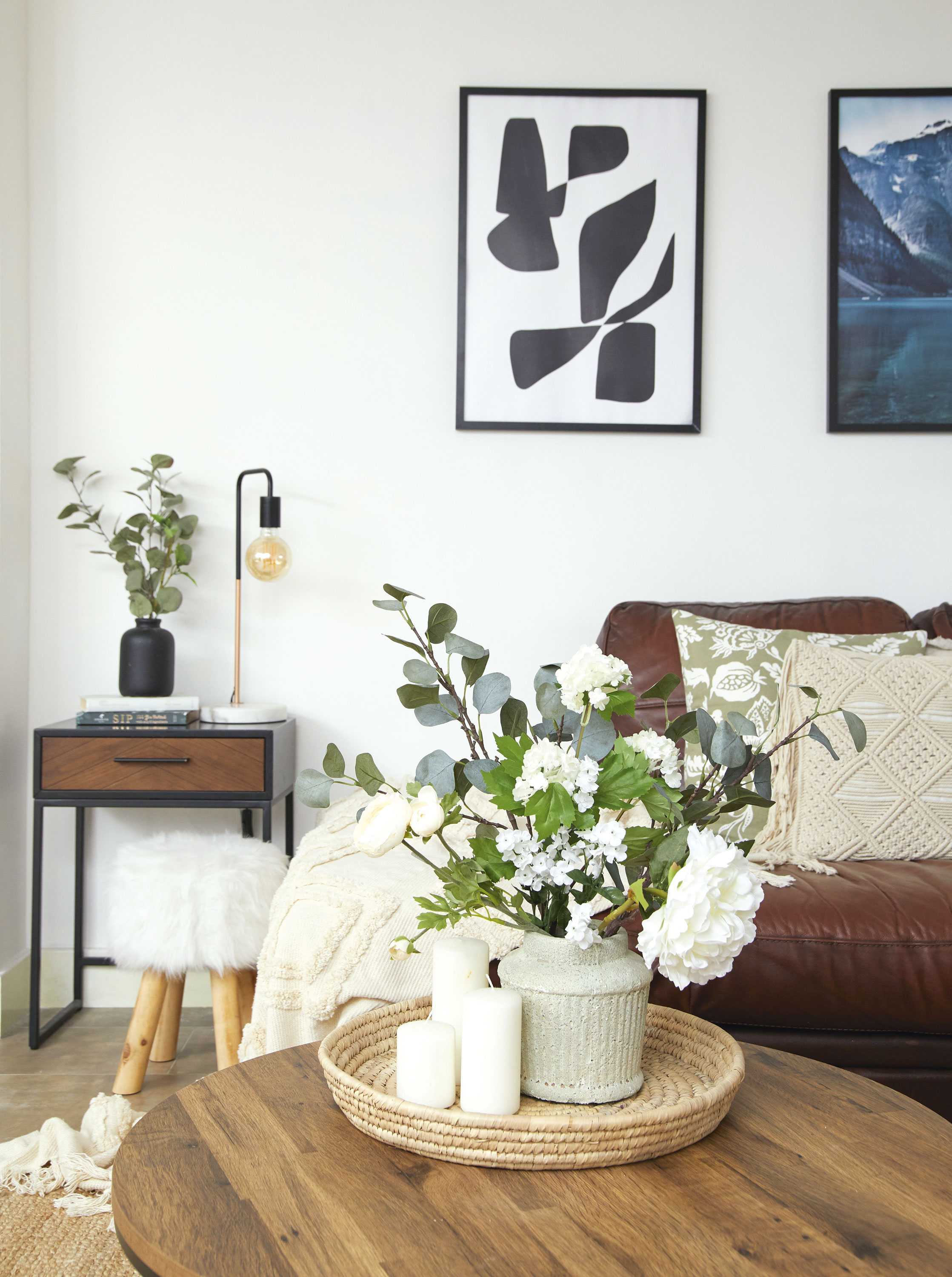 ‘I always have fresh flowers on the dining table, but faux flowers look so good nowadays that I keep this arrangement here all year round. The side table is from HomeSense and the lamp was an Aldi Specialbuy’